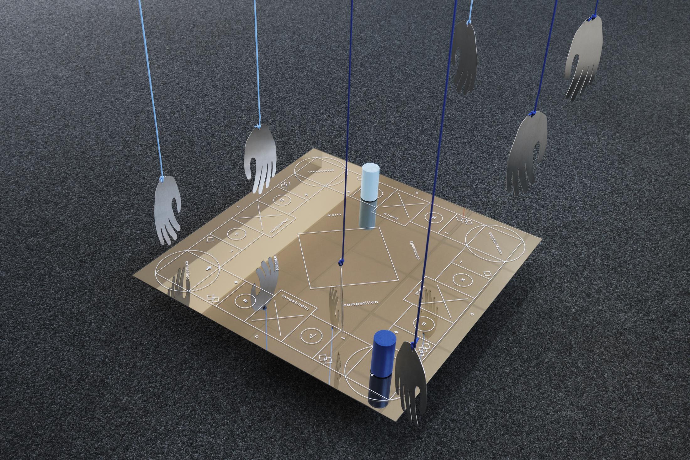 Exhibition View Philip Ullrich Solo Show «Remmidemmi in der Spielhölle (The Game Show); view on Philip Ullrich, at play (off the charts), 2023, screen print on mirror, painted wood, metal, paracord mirror: 75 x 75 x 0.4 cm, with hands: dimensions variable» at unanimous consent, Zurich, 2023 / Photo: Philip Ullrich / Courtesy: the artist and unanimous consent