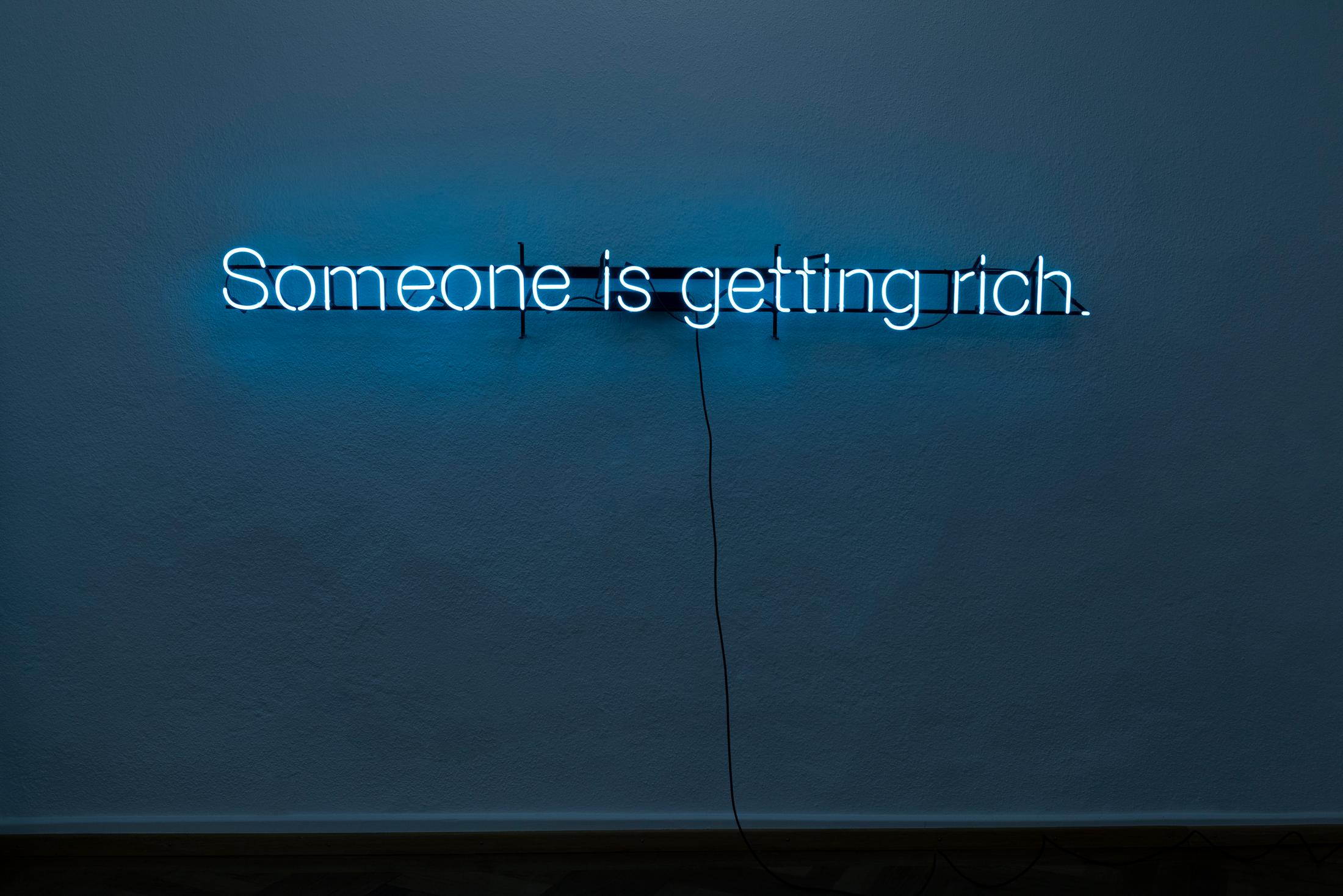 Exhibition View Group Show «Radical Sources; view on Claire Fontaine, Untitled (Someone is getting rich), 2012» at Krone Couronne, Biel, 2022 / Photo: Michal Florence Schorro / Courtesy: the artists and Krone Coronne