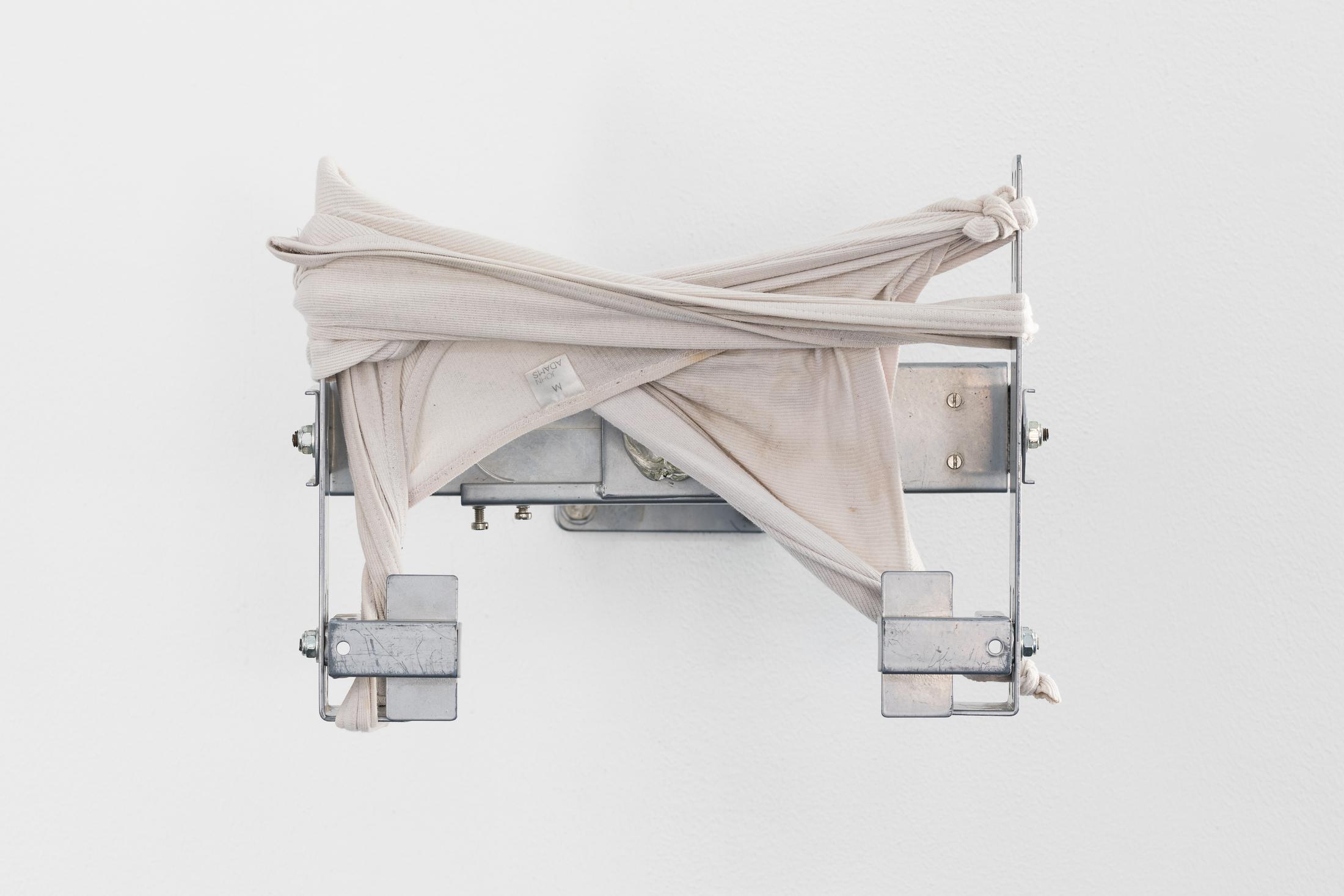 Exhibition View Duo Show «Robert Estermann and Oz Oderbolz; view on Oz Oderbolz, Daddy’s Shirt, 2023, metal, tanktop (stolen from dad), tin, ca. 30 x 41 x 37.5 cm» at Last Tango, Zurich, 2023 / Photo: Kilian Bannwart / Courtesy: the artist and Last Tango