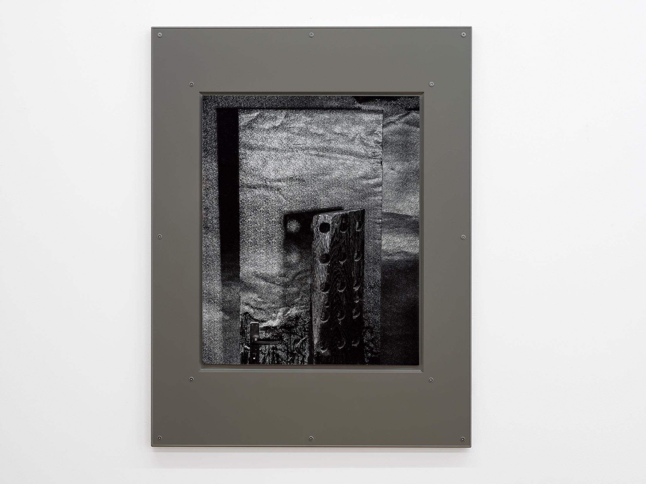 Exhibition View Stefan Burger Solo Show «Softbox; view on Stefan Burger, Silbriges Bild mit Löchern, Gelatin silver print, Lacquered steel plate, Acrylic glass, 2023» at Kirchgasse Gallery, Steckborn, 2023 / Photo: Cedric Mussano / Courtesy: the artist and Kirchgasse Gallery