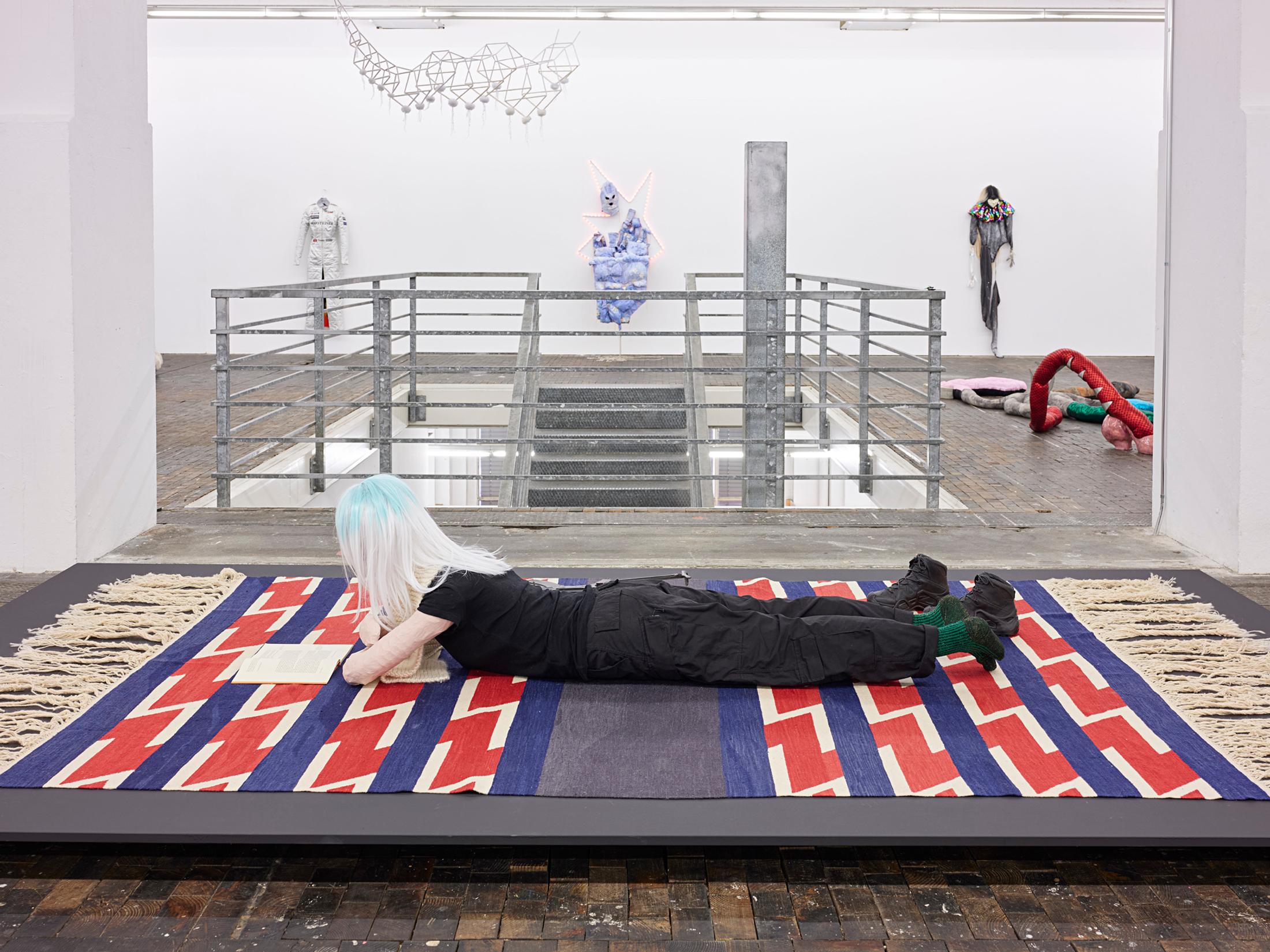 Exhibition View Group Show «Stitches: Scènes, corps, décors;  view on Sylvie Fleury, Vidya Gastaldon (upward), Andrea Cindy Raemy, Manon Wertenbroek, Nicola Genovese, Mai-Thu Perret (forward), (l.t.r.)» at Le Commun, Geneva, 2021 / Photo: Nicolas Delaroche Studio / Courtesy: the artists and Le Commun