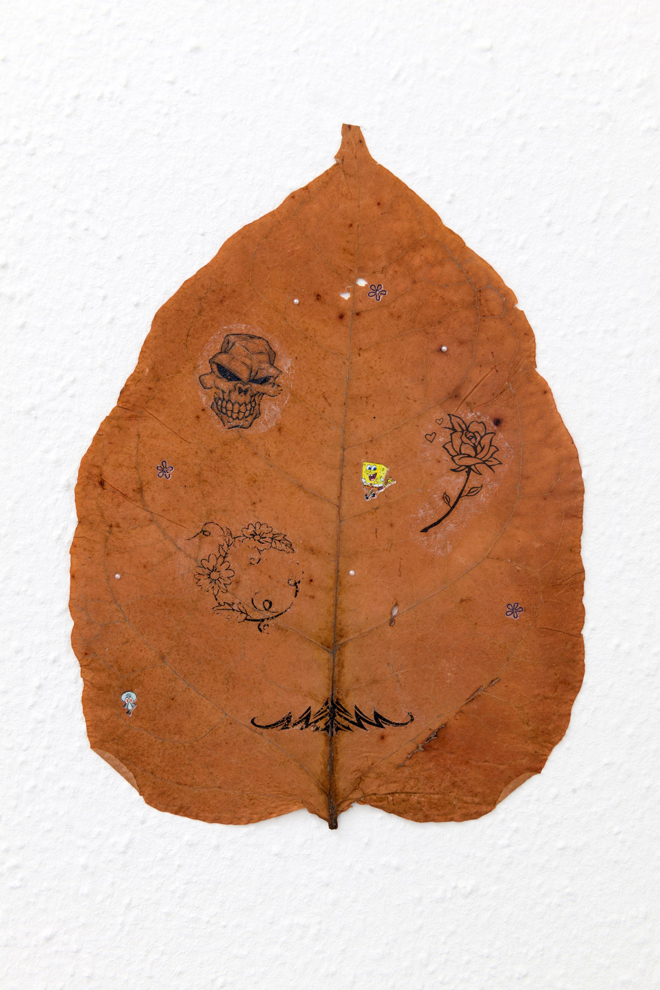 Exhibition View Group Show «Stop thinking about forever; view on Johanna Blank, Leaves, 2019, Pressed leaves (unknown plant), spongebob nail stickers, temporary tattoos, Essence bling bling nail stickers, 18.5 x 25 cm» at Hamlet, Zurich, 2022-2023 / Photo: Patrick Cipriani / Courtesy: the artists and Hamlet