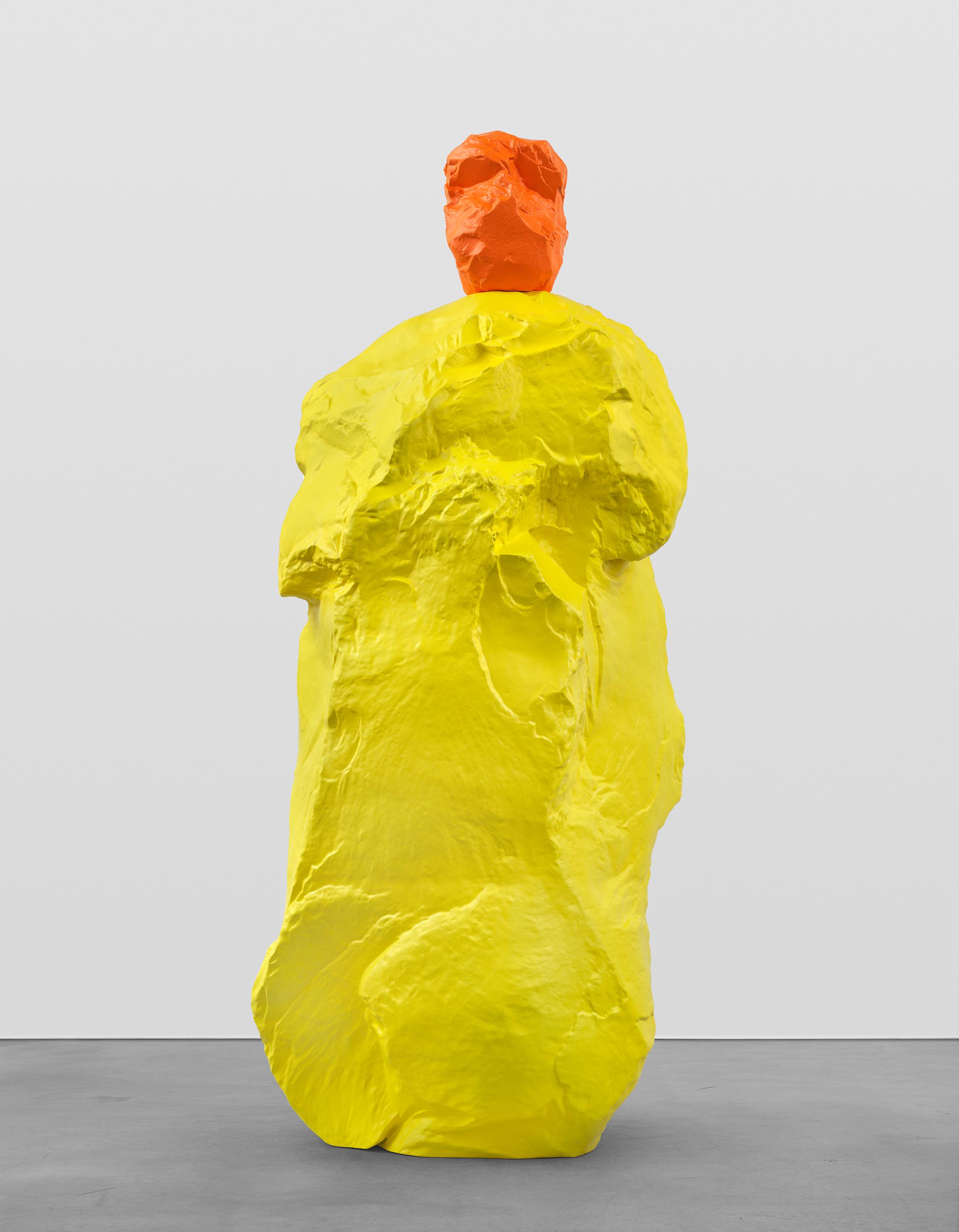 Exhibition View Ugo Rondinone Solo Show «nuns + monks; view on Ugo Rondinone, orange yellow monk, 2020, Painted bronze, 293.5 x 102 x 130.5 cm» at Galerie Eva Presenhuber, Maag Areal, Zurich, 2020 / Photo: Stefan Altenburger / © Ugo Rondinone / Courtesy the artist and Galerie Eva Presenhuber, Zurich / New York