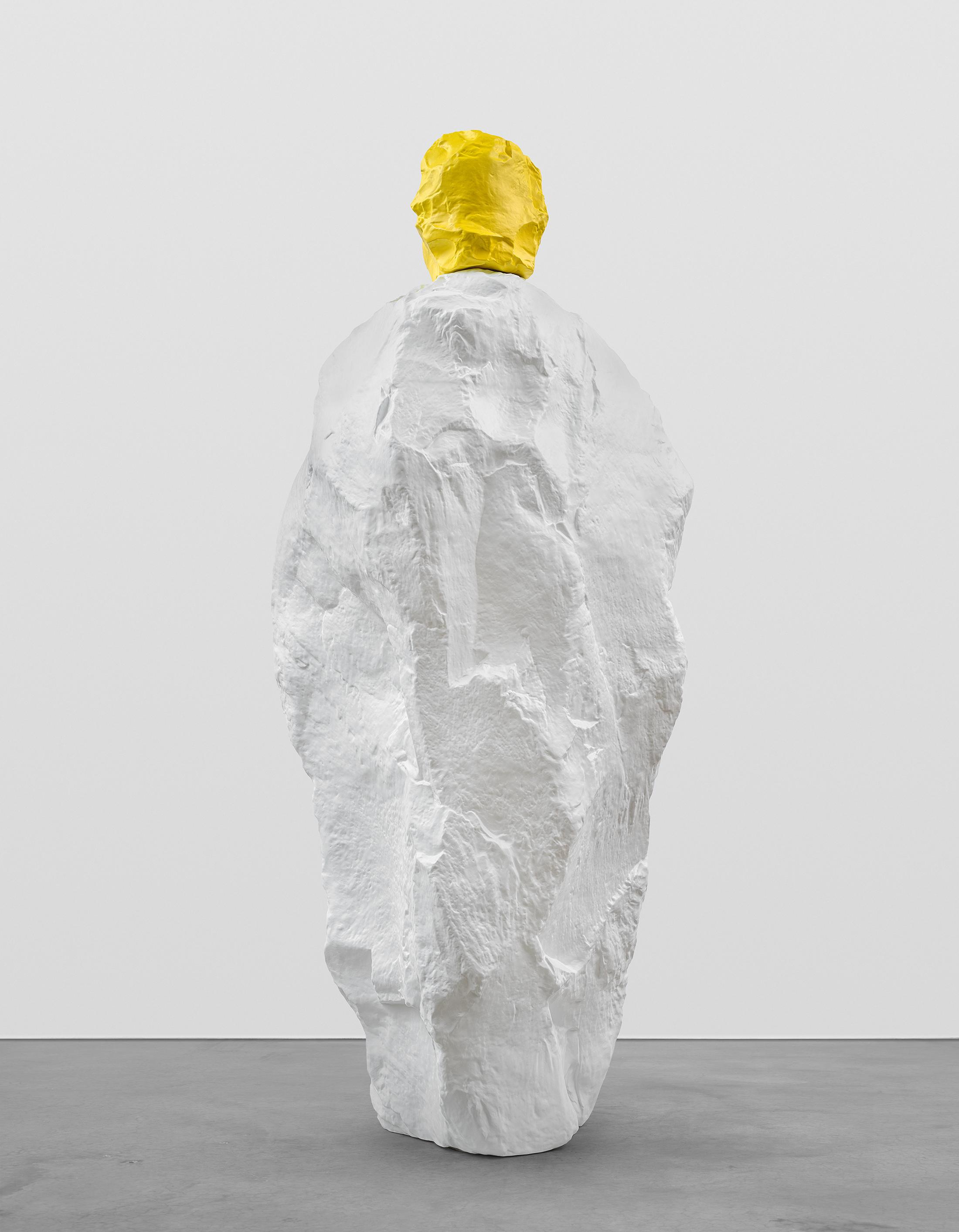 Exhibition View Ugo Rondinone Solo Show «nuns + monks; view on Ugo Rondinone, yellow white monk, 2020, Painted bronze, 295 x 93 x 125 cm» at Galerie Eva Presenhuber, Maag Areal, Zurich, 2020 / Photo: Stefan Altenburger / © Ugo Rondinone / Courtesy the artist and Galerie Eva Presenhuber, Zurich / New York