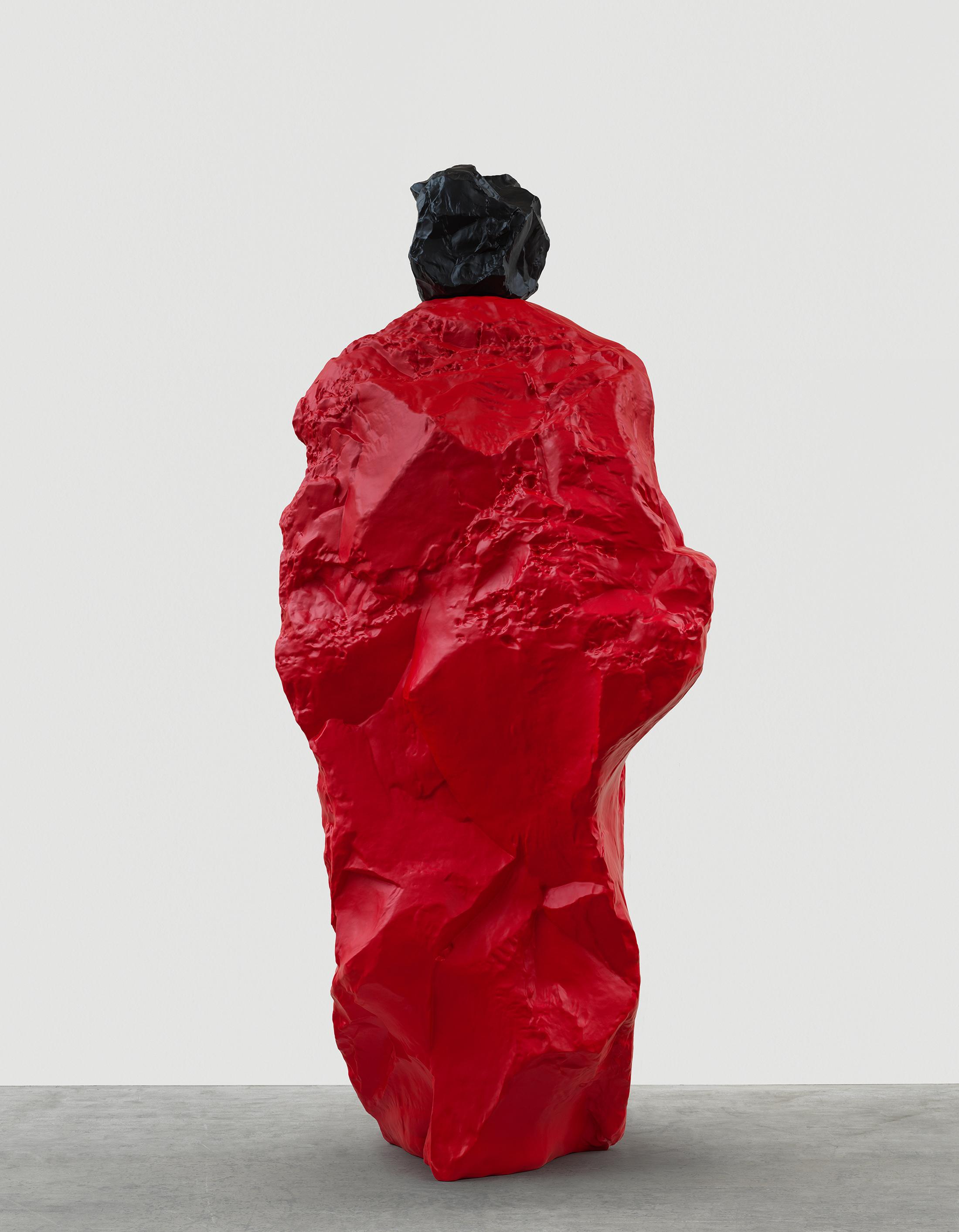Exhibition View Ugo Rondinone Solo Show «nuns + monks; view on Ugo Rondinone, black red nun, 2020, Painted bronze, 294.5 x 114.5 x 121 cm» at Galerie Eva Presenhuber, Maag Areal, Zurich, 2020 / Photo: Stefan Altenburger / © Ugo Rondinone / Courtesy the artist and Galerie Eva Presenhuber, Zurich / New York