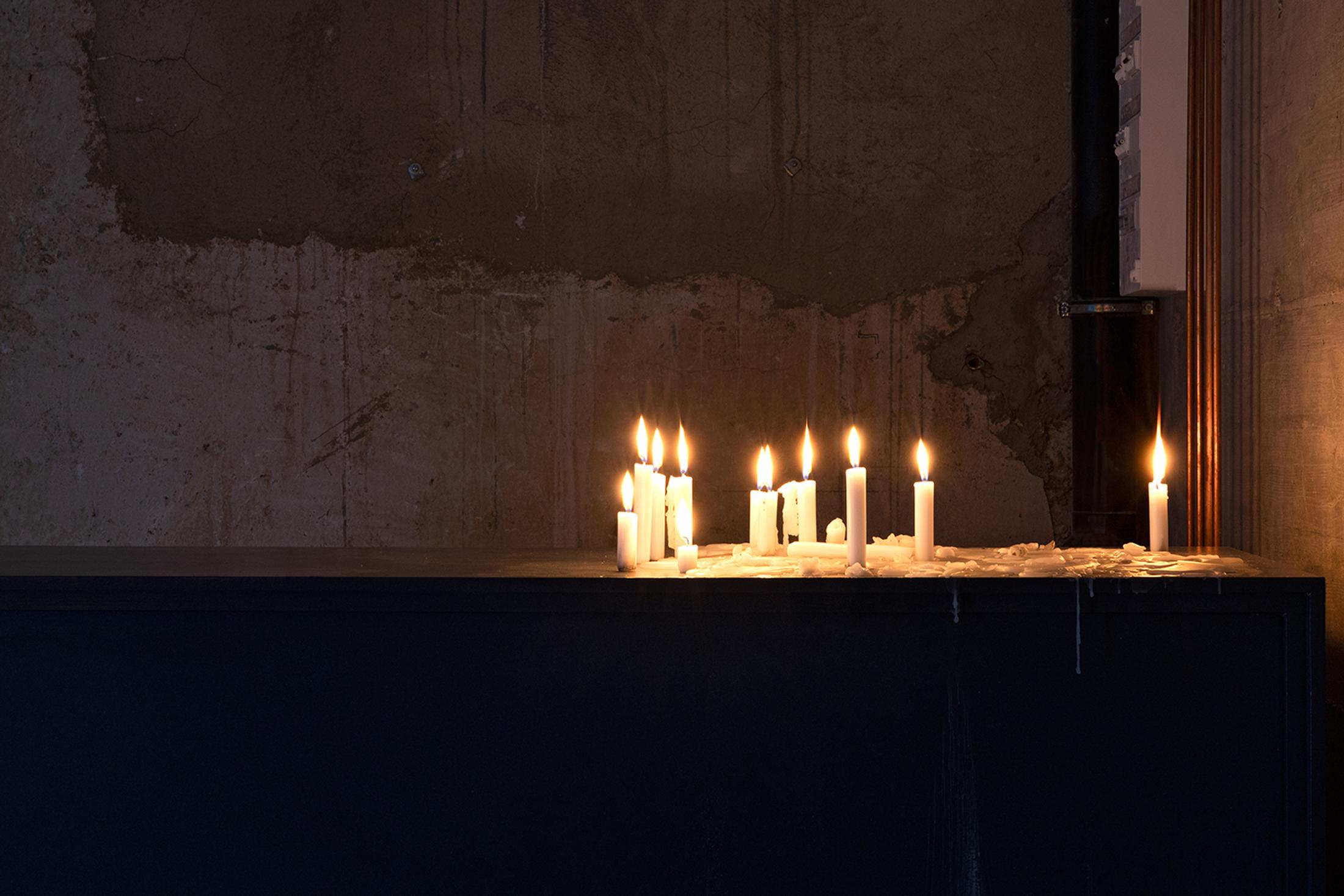 Exhibition View Group Show «Unbetrauerbar; view on Norbert Klassen, part of the cycle, Menschen, 1979-2009, dimensions variable, candles» at For, Basel, 2022 / Photo: Gina Folly / Courtesy: the artist and For