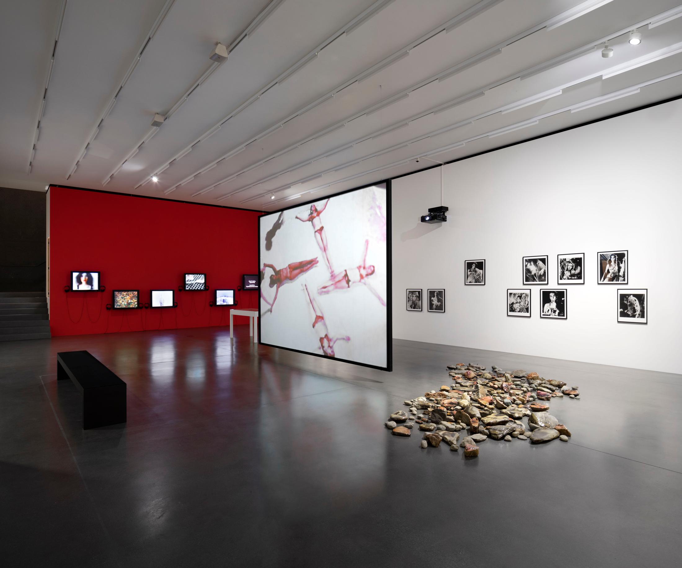 Exhibition View Groupshow «Up to and Including Limits: After Carolee Schneemann; view on Carolee Schneemann, Meat Joy, 1964/2008 and Aura Rosenberg, Dialectical Porn Rock Circle, 1990–1993» at Muzeum Susch, Susch, 2019-2020 / Photo: Maja Wirkus / Courtesy: the artist and Muzeum Susch