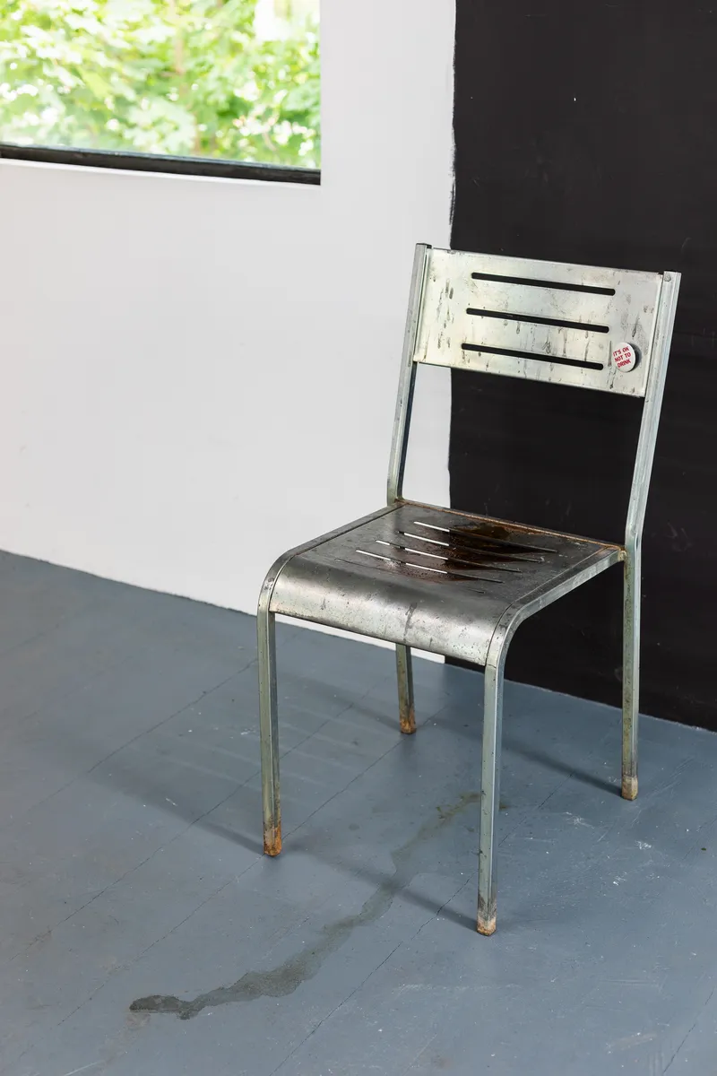 Exhibition View Groupshow «Whispering Walls; view on Caterina De Nicola, Embarrassed and Conciliatory, Bored and Noncommittally, 2020, iron chair, rust, urine, pin, 84x43.5x50cm» at Last Tango, Zurich, 2020 / Photo: Kilian Bannwart / Courtesy: the artists and Last Tango