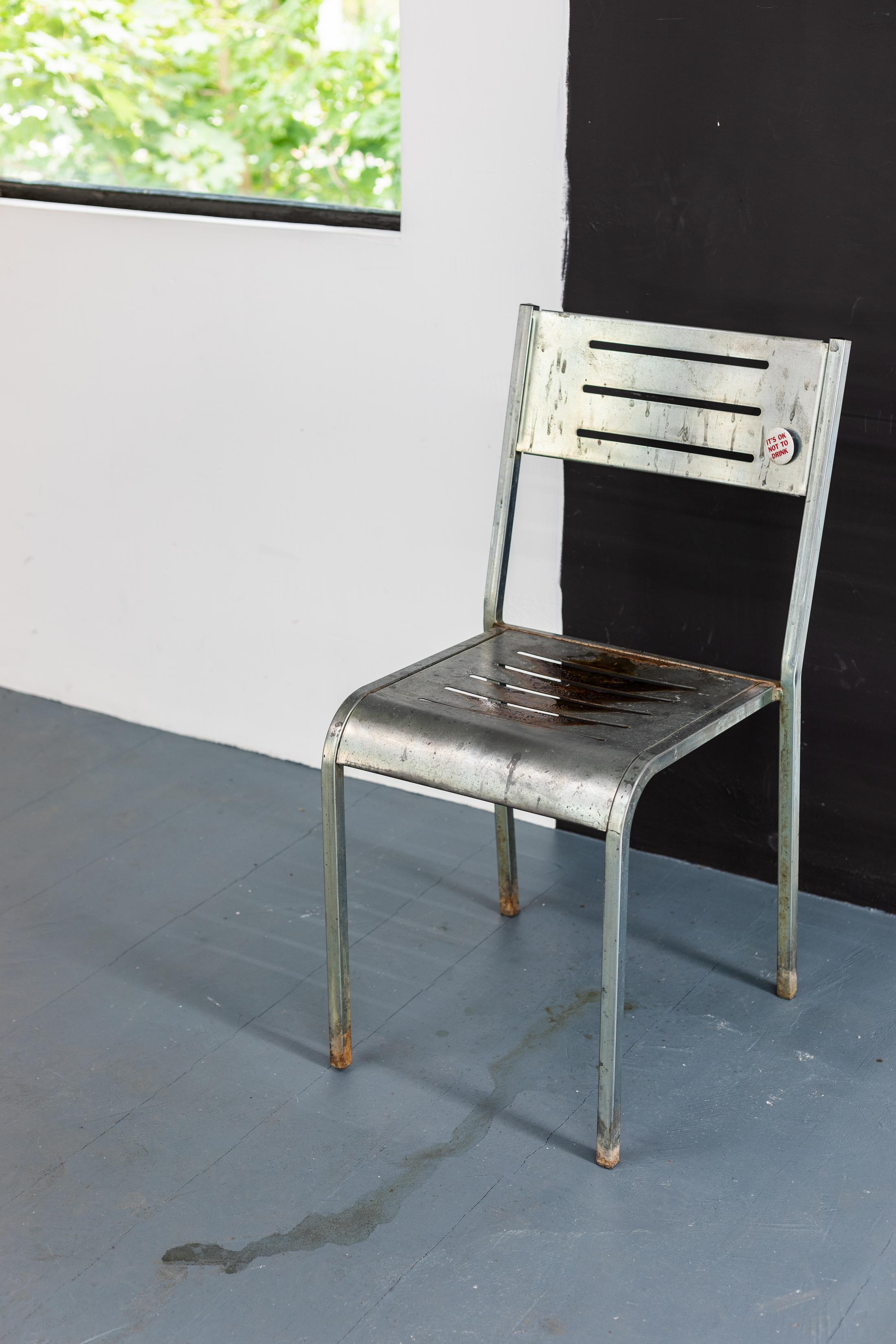 Exhibition View Groupshow «Whispering Walls; view on Caterina De Nicola, Embarrassed and Conciliatory, Bored and Noncommittally, 2020, iron chair, rust, urine, pin, 84x43.5x50cm» at Last Tango, Zurich, 2020 / Photo: Kilian Bannwart / Courtesy: the artists and Last Tango