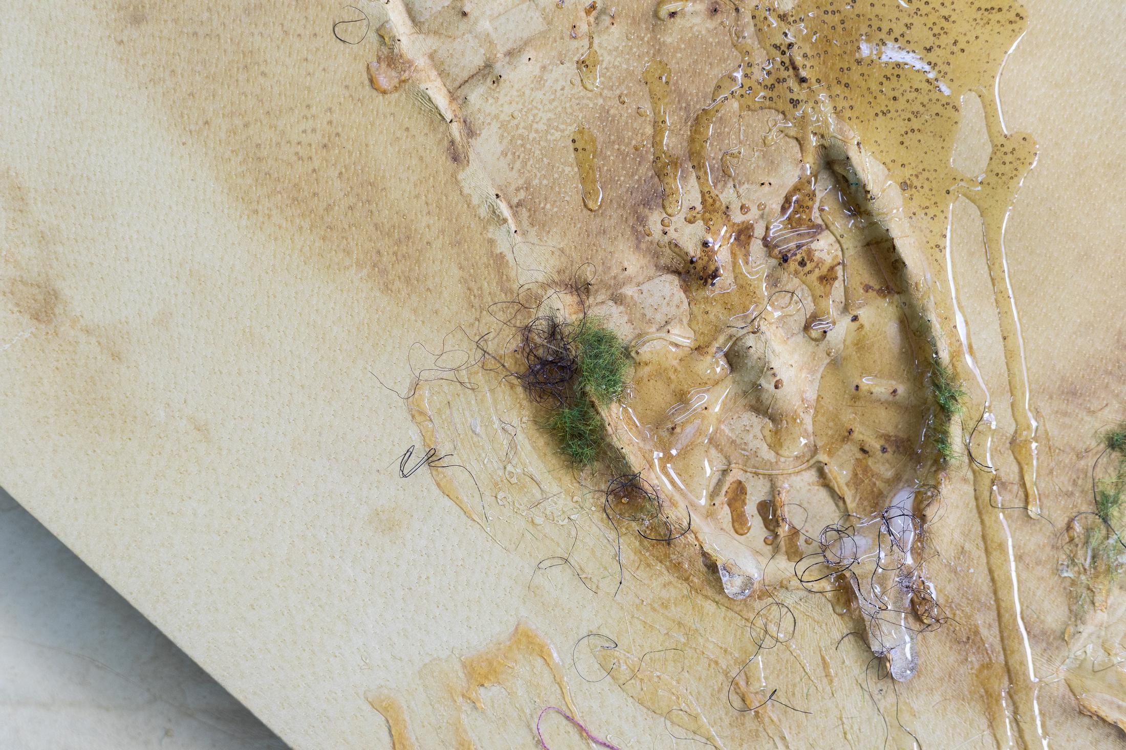 Exhibition View Groupshow «Whispering Walls; view on Caterina De Nicola, Bay West Is to Yield to It, 2020, wooden frame, pig leather, synthetic fur pom-pom, diorama grass, hair, nylon tights, resin, natural latex, 100x107x8cm (detail)» at Last Tango, Zurich, 2020 / Photo: Kilian Bannwart / Courtesy: the artists and Last Tango