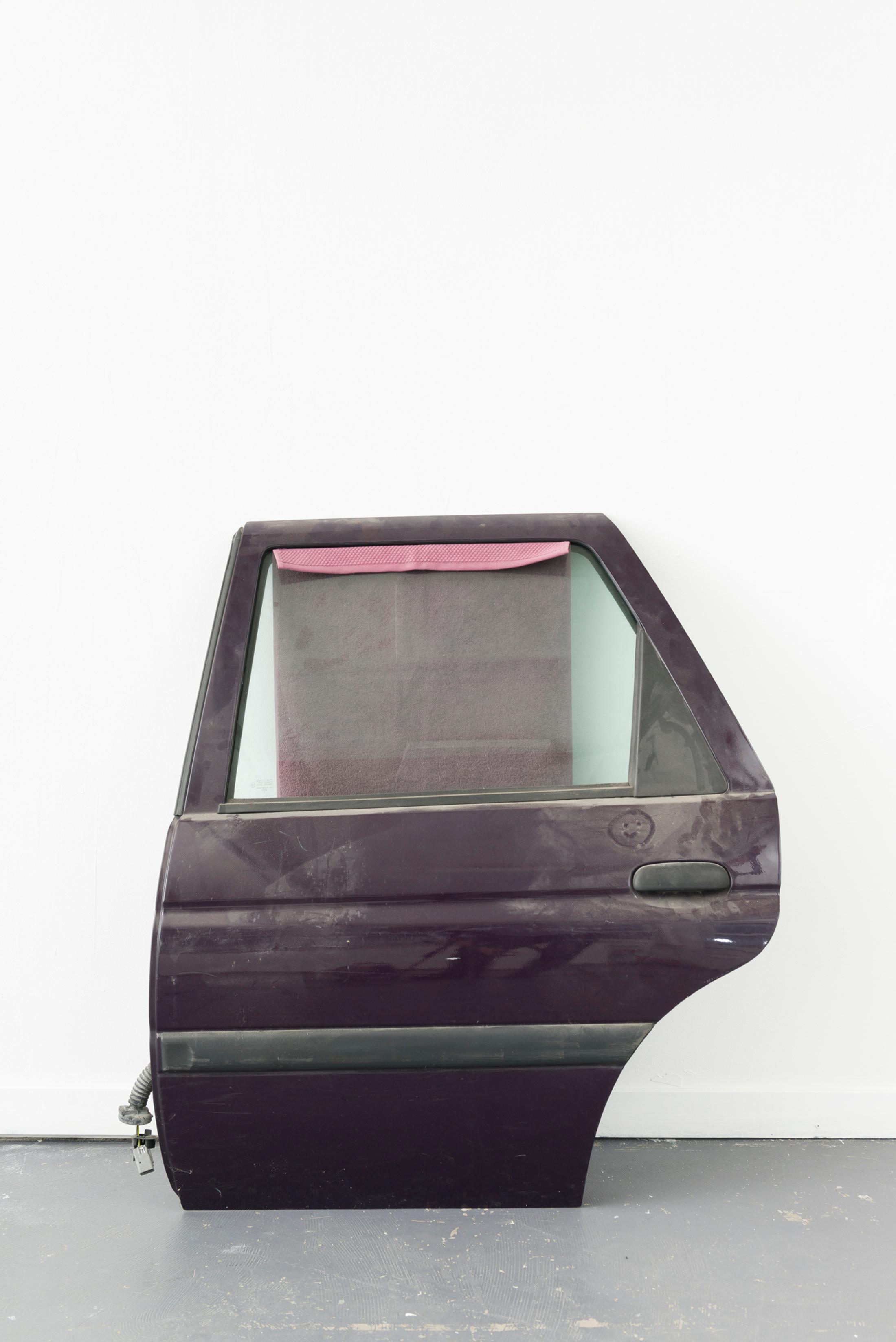 Exhibition View Yvan Alvarez & Paul Hutzli Duo Show «Why do pizza boxes have a square shape?; view on Yvan Alvarez, Untitled, 2020, car door, towel, 120 x 90 x 20 cm» at Soul2Soul, Ressources Urbaines, Geneva, 2020 / © Yvan Alvarez / Courtesy: the artists