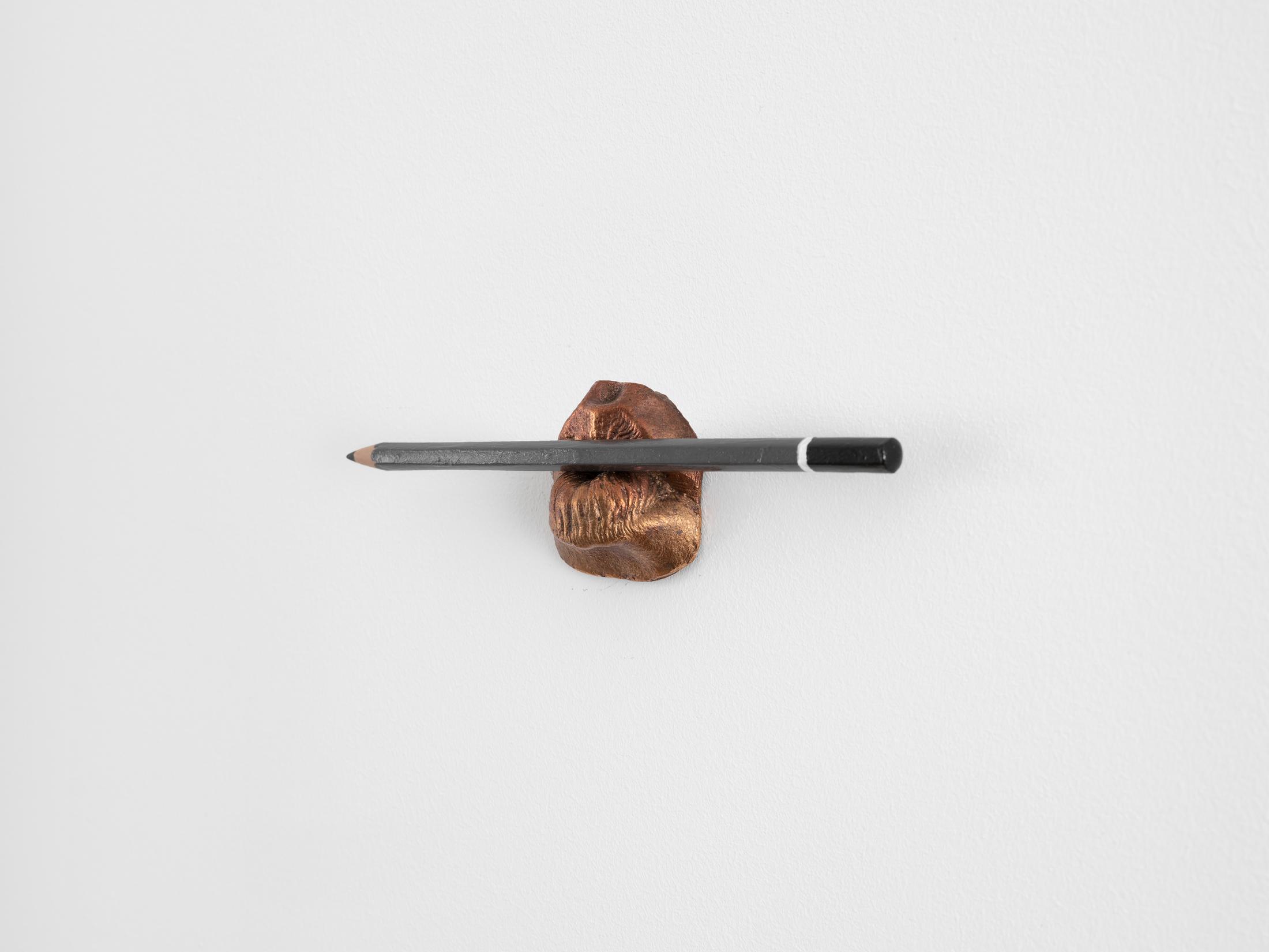 Exhibition View Alfredo Aceto Solo Show «My Italian is a Little Rusty; view on Alfredo Aceto, Bocca con Matita, 2020, Cast bronze, oil paint, 5 x 17 x 3,5 cm» at Galerie Lange + Pult, Auvernier, 2021 / Photo: Julien Gremaud / Courtesy: the artist and Lange + Pult