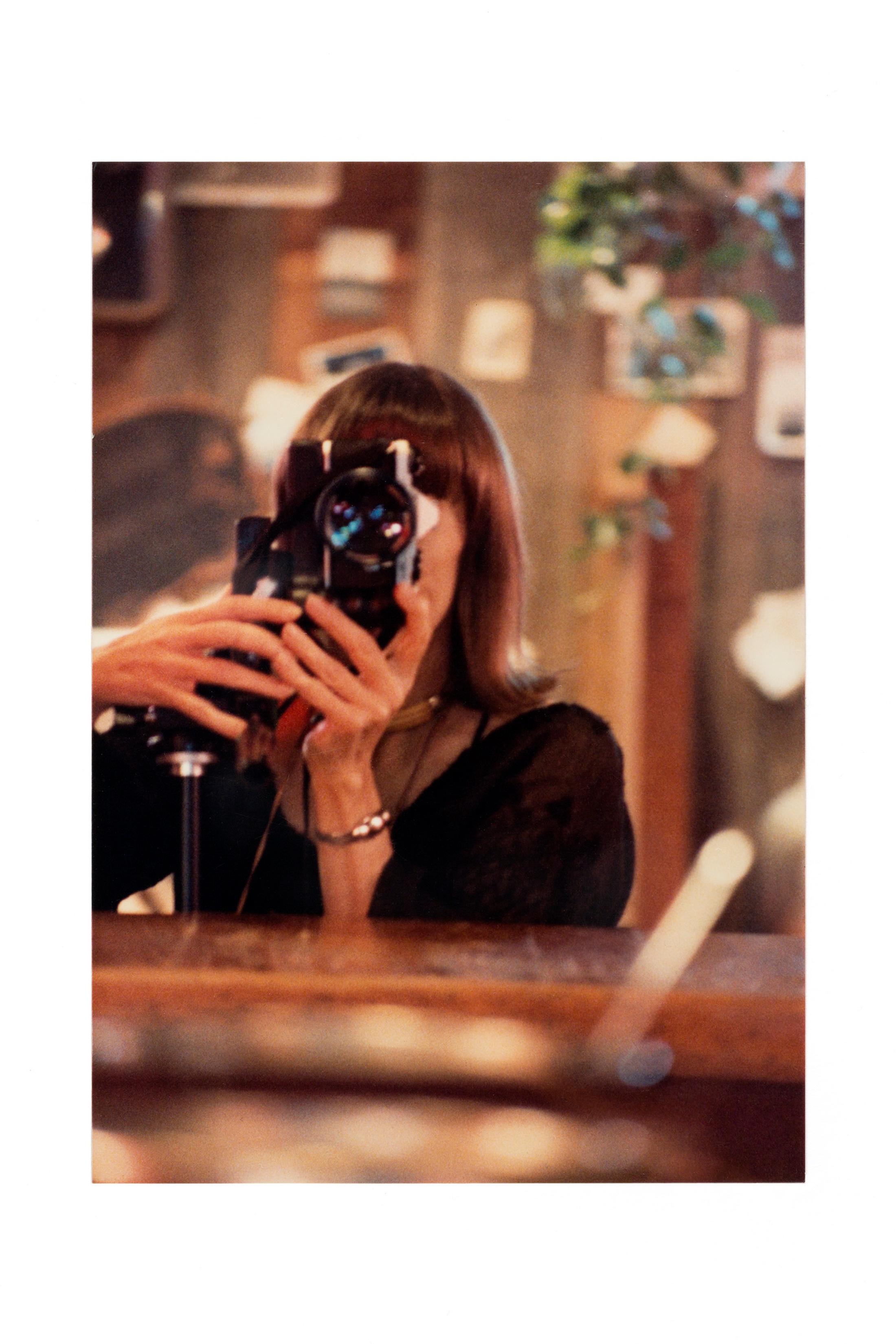 Anne Collier, from the series Women With Cameras (Self Portrait), 2017 at Fotomuseum Winterhtur, 2019 / © Anne Collier / Courtesy of the artist; Anton Kern Gallery, New York; Galerie Neu, Berlin; and The Modern Institute/Toby Webster Ltd., Glasgow