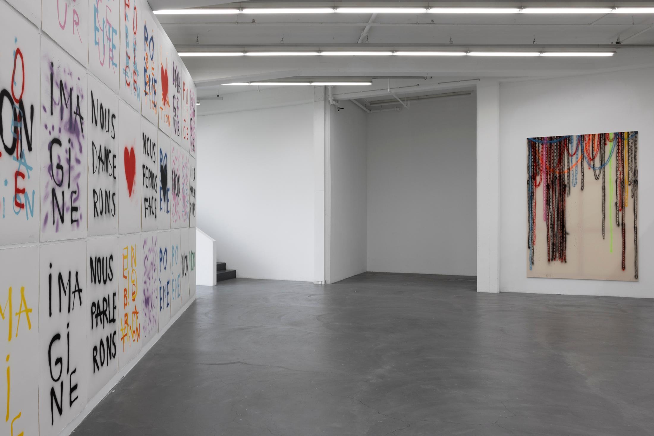 Exhibition View Anne-Lise Coste Solo Show «Poem Police; view on Anne-Lise Coste, Lithography (left), 2021 and Chains IV (right), 2022» at Kunsthaus Baselland, Baselland, 2022 / Photo: Gina Folly / Courtesy: the artist and Galerie Elisabeth & Reinhard Hauff, Ellen de Bruijne, NoguerasBlanchard, Lullin + Ferrari, CAN Christina Androulidaki Gallery