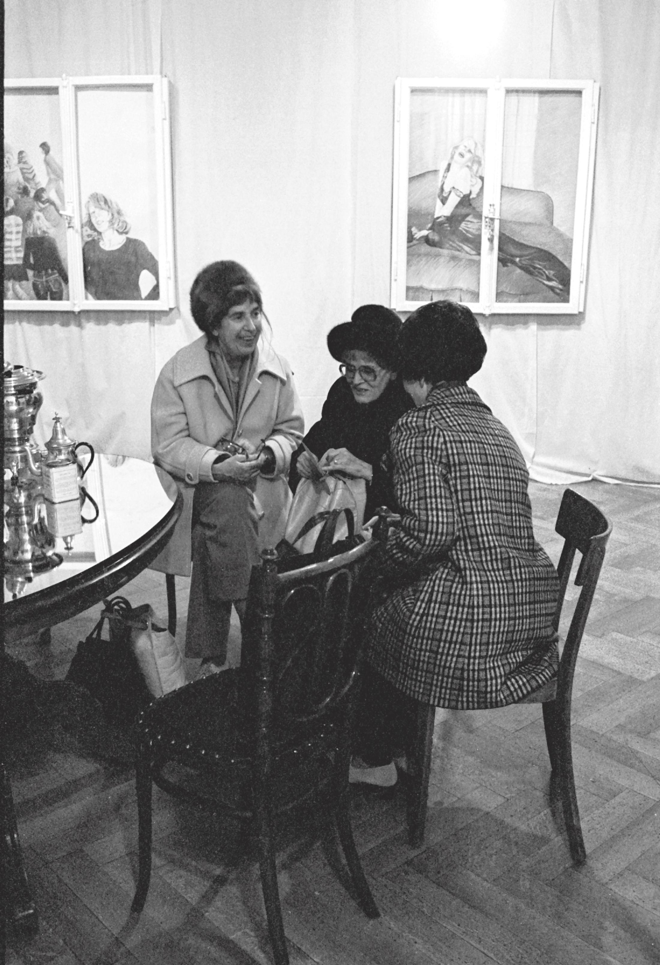 Exhibition View Groupshow «Ausbruch & Rausch, Zurich 1975-1980, Women Art Punk; view on visitors with two window paintings by Cristina Fessler in the background / Photo: Ruth Vögtlin, 1975» at Strauhof, Zurich, 2020