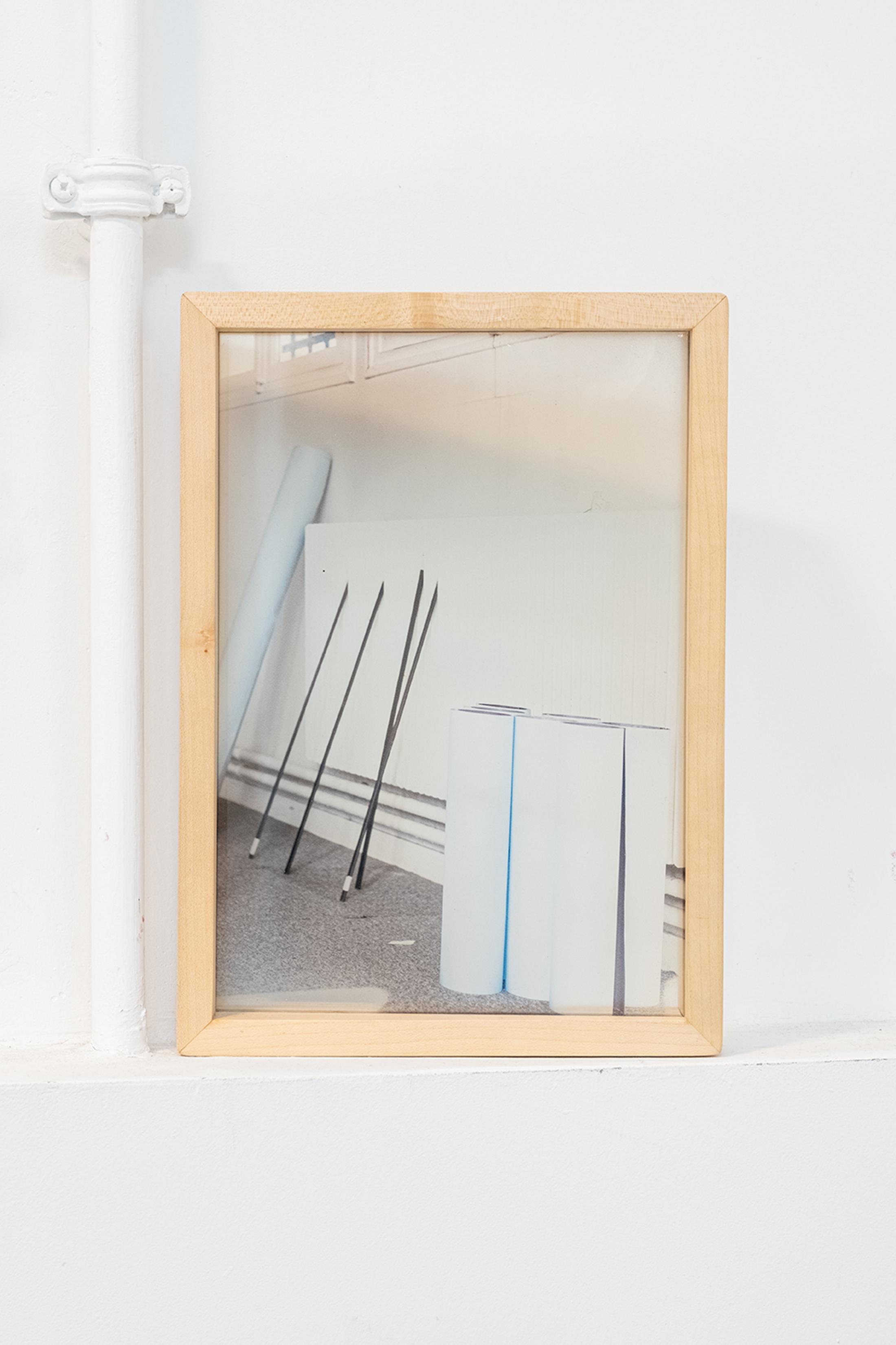 Exhibition View Group Show «Collections d’Artistes; view on Aurélie Pétrel, Déclinaison #1, 2015, direct print on glass 5 mm, framed with sycamore wood, 31 x 22 x 4.1 cm» at Le Commun, Geneva, 2025 / Photo: Daniel Leal / Courtesy: Spielact Festival