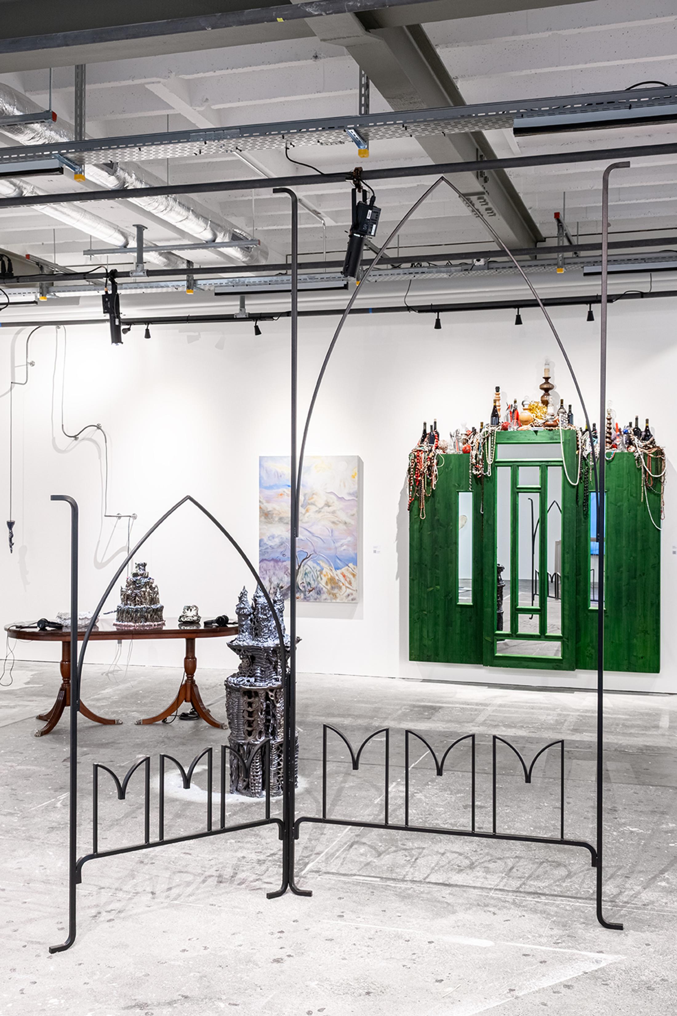 Exhibition View Group Show «Collections d’Artistes; view on Jeanne Tara, Qui fait tenir la maison?, 2024, wrought iron, 300 x 230 cm» at Le Commun, Geneva, 2025 / Photo: Daniel Leal / Courtesy: Spielact Festival