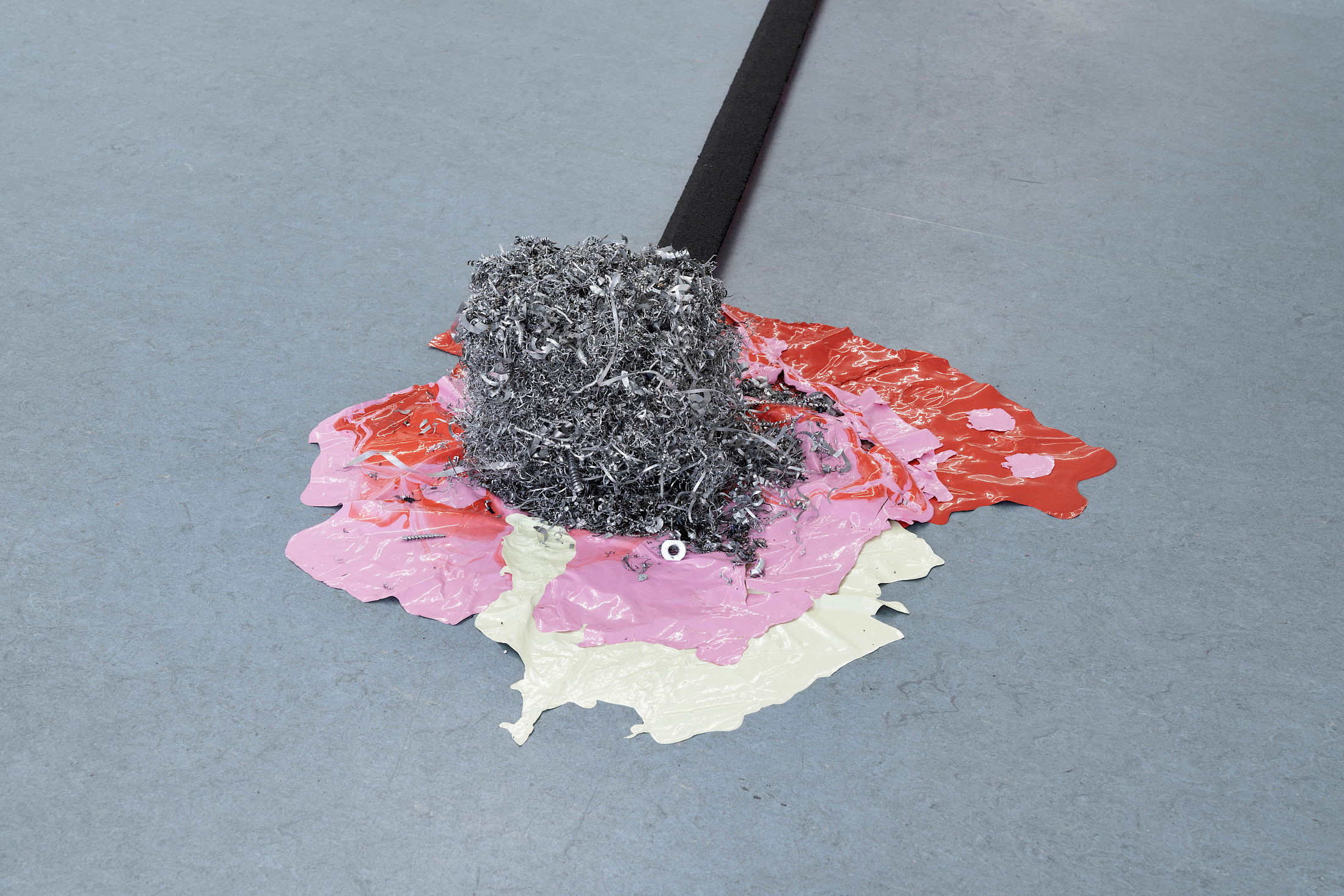 Exhibition View Salomé Engel Solo Show «From Cowboy to Cobaye; view on Salomé Engel, Needles: Insinuation of Sailing Motes II (detail), 2025, Metal debris, wood, laquer, coloured sand, 834 × 66 × 26cm.» at marytwo, Lucerne, Switzerland, 2025 / Photo: marytwo / Courtesy: the artist and marytwo