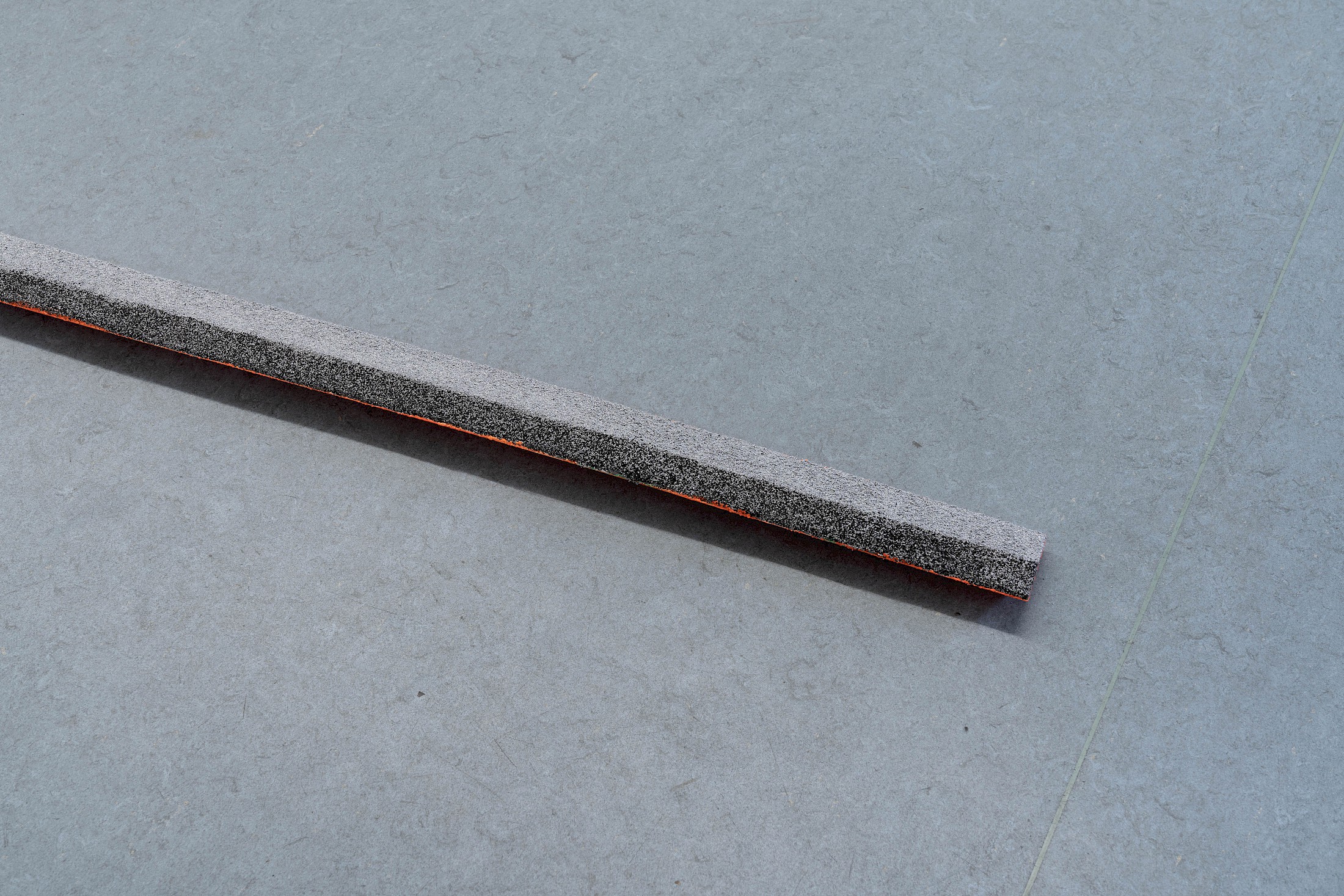 Exhibition View Salomé Engel Solo Show «From Cowboy to Cobaye; view on Salomé Engel, Needles: Insinuation of Sailing Motes II (detail), 2025, Metal debris, wood, laquer, coloured sand, 834 × 66 × 26cm.» at marytwo, Lucerne, Switzerland, 2025 / Photo: marytwo / Courtesy: the artist and marytwo