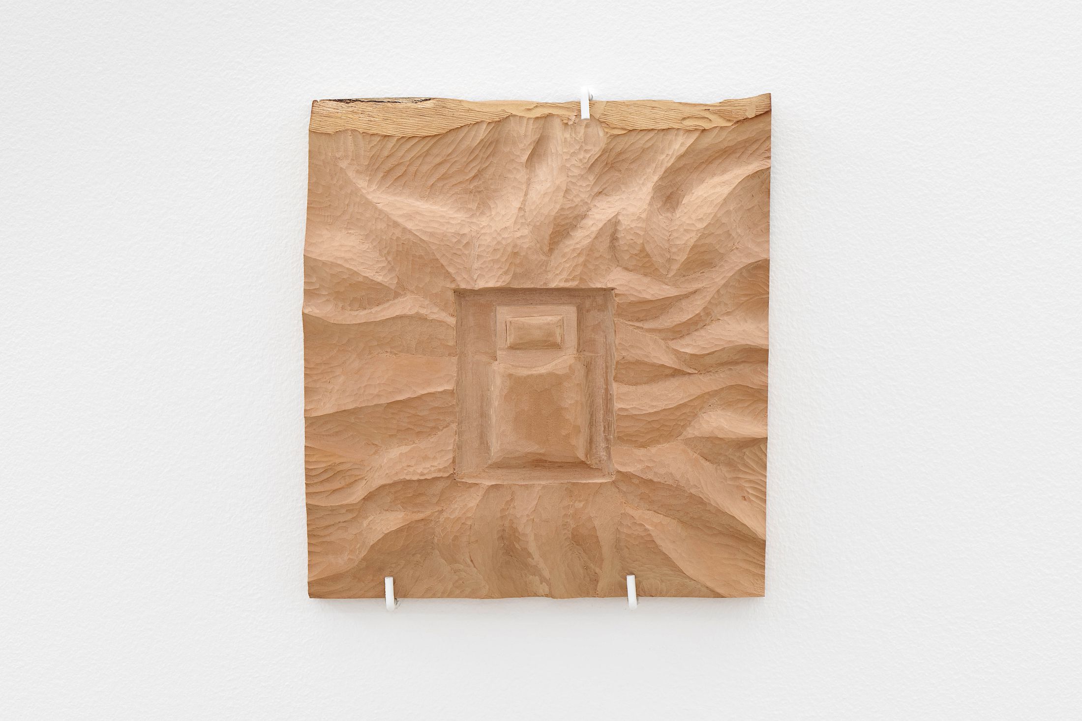 Exhibition View Group Show «Defiant Gardens ; view on Zahra Hakim, Un Éclat d’une Lumière Perdue I, II & III, 2025, Carved wood» at Halle Nord, Geneva, 2025 / Photo: Thomas Maisonnasse / Courtesy: the artists and Halle Nord