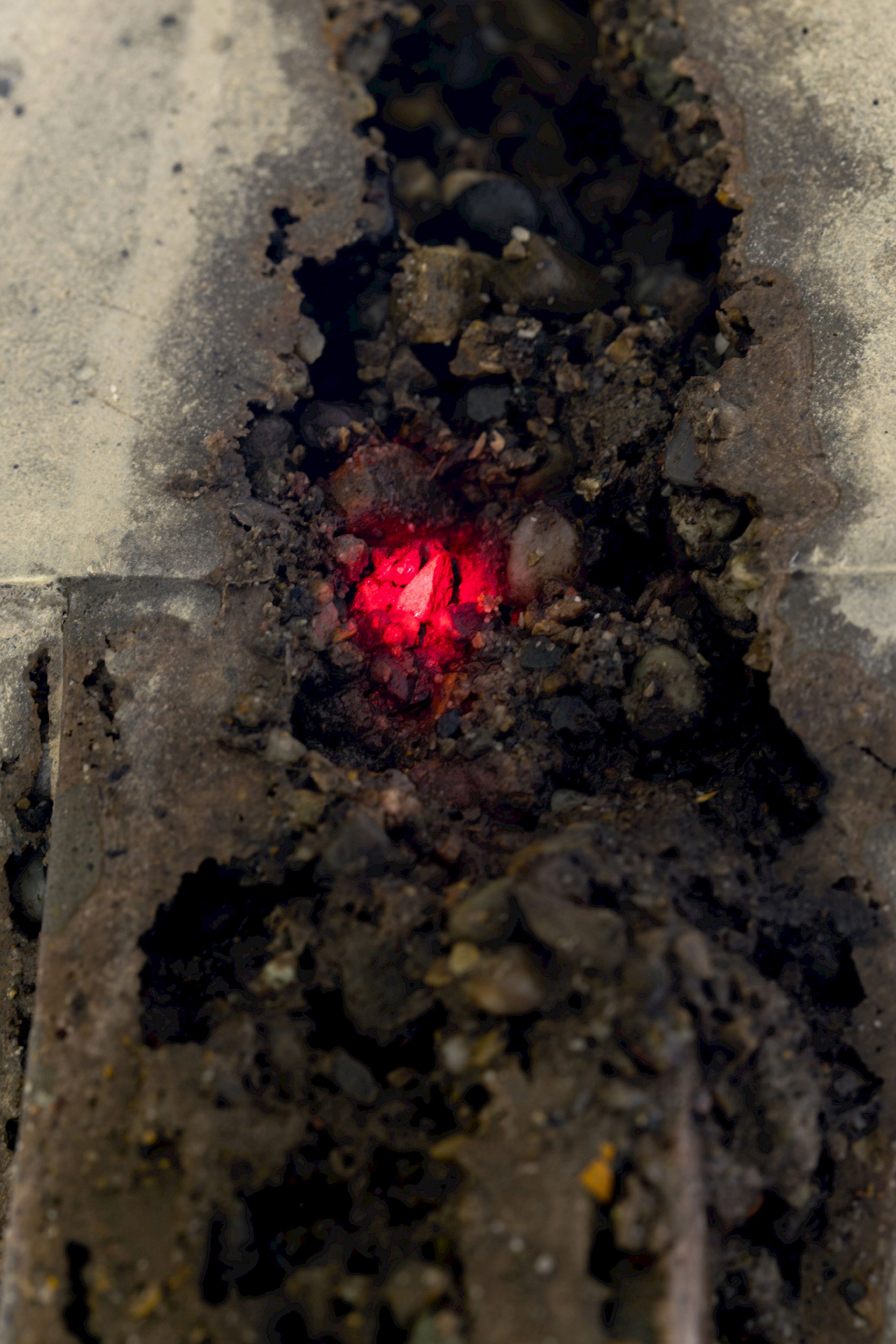 Exhibition View Solo Show Hunter Longe «Entgleitungen ; view on Degradation Pathway, 2025, (detail), laser distance sensor, mounting system, projector, video loop, lenses, dimensions variable» at City SALTS, Baselland, 2025-2026 / Photo: Nicolas Gysin / Courtesy: the artist and City SALTS