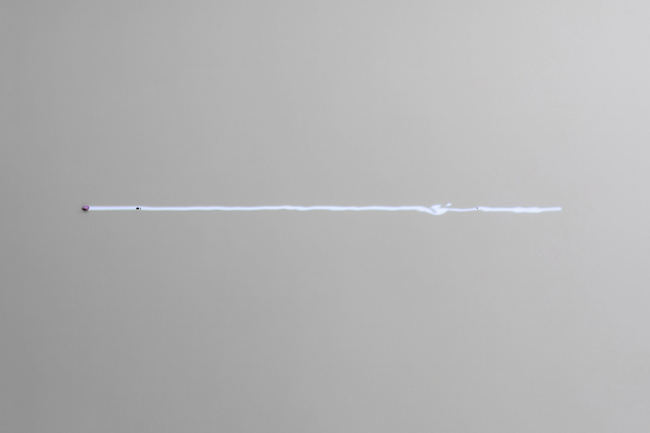 Exhibition View Solo Show Hunter Longe «Entgleitungen ; view on The past inserts a finger into a slit on the skin of the present and pulls 3, 2025, phosphosiderite, magnetite crystal, thin slice of a mouse’s brain saturated in heavy metals: osmium, lead and uranium, LSD blotter tab, dimensions variable» at City SALTS, Baselland, 2025-2026 / Photo: Nicolas Gysin / Courtesy: the artist and City SALTS