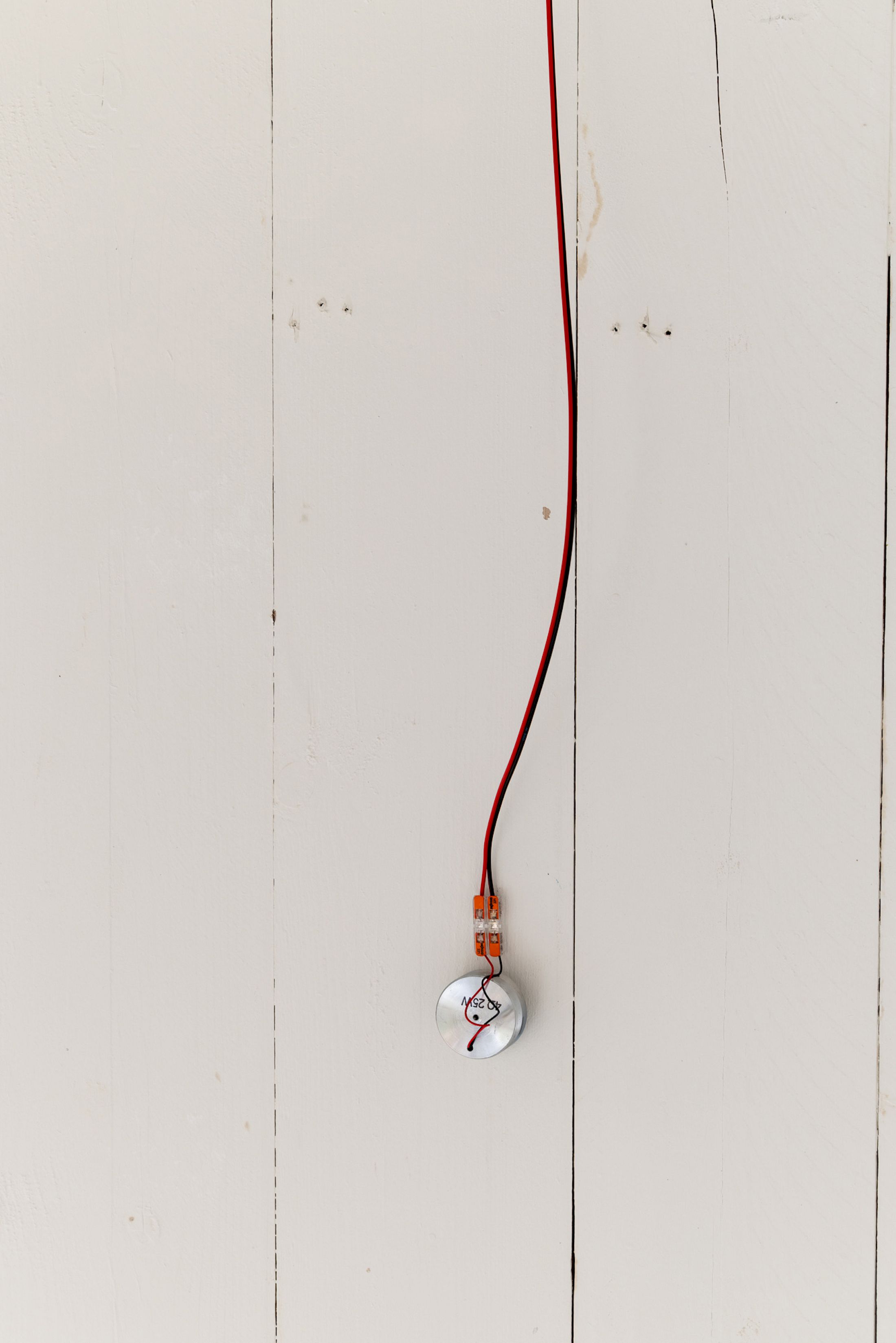 Exhibition View Solo Show Hunter Longe «Entgleitungen ; view on Hunter Longe in collaboration with Janiv Oron, High Static, Dead Lines, 2025, 8.1 channel sound installation - electric rely, coil, timer, contact mics, transducers, sub, mixer, media players, audio, starter, fluorescent lights, dimensions variable» at City SALTS, Baselland, 2025-2026 / Photo: Nicolas Gysin / Courtesy: the artist and City SALTS