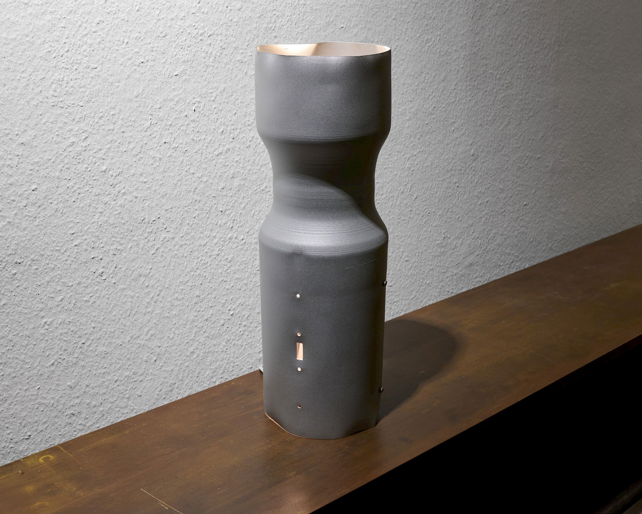 Exhibition View Solo Show Marie Matusz «Shift ; view on Propellers (object to object, respect to respect), 2025, Sandblasted, aluminium coated steel, lightbulb, 21 x 58 x 21 cm» at Blue Velvet, Zurich, 2025-2026 / Photo: Flavio Karrer / Courtesy: the artist and Blue Velvet