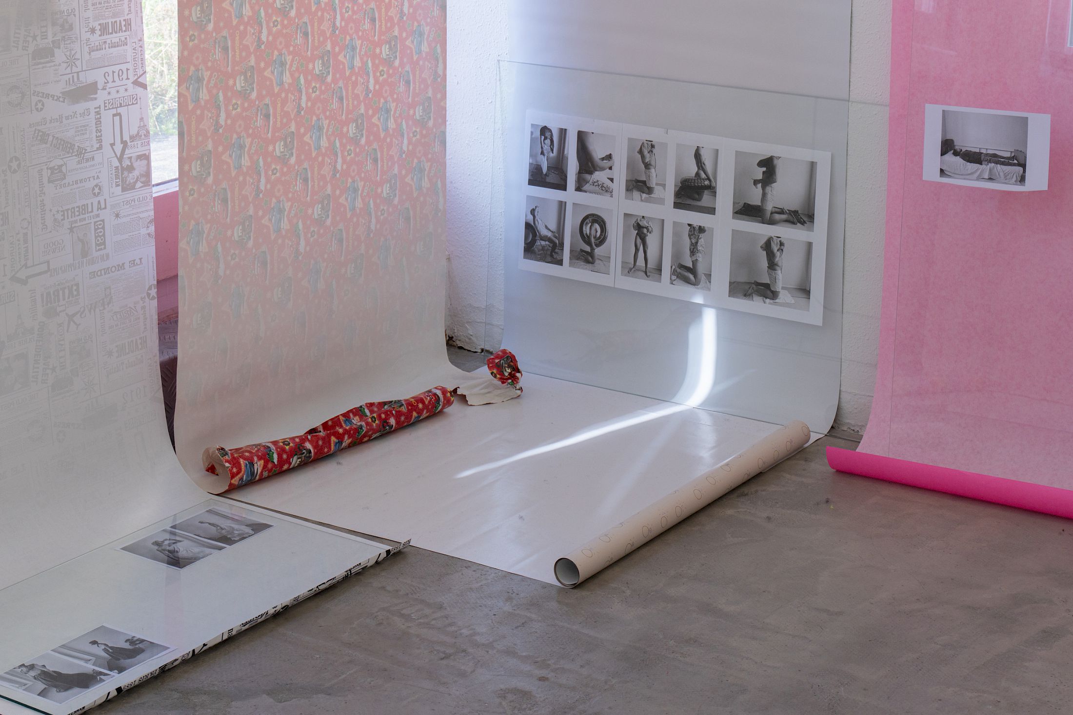 Exhibition View Solo Show Sven Gex «celebratory ; view on printed images from the ‚character fitting‘ series 2021-ongoing, gift wrapping paper, nails, glass» at Halmet, Zurich-Oerlikon, 2025 / Photo: Tereza Glazova / Courtesy: the artist and Halmet