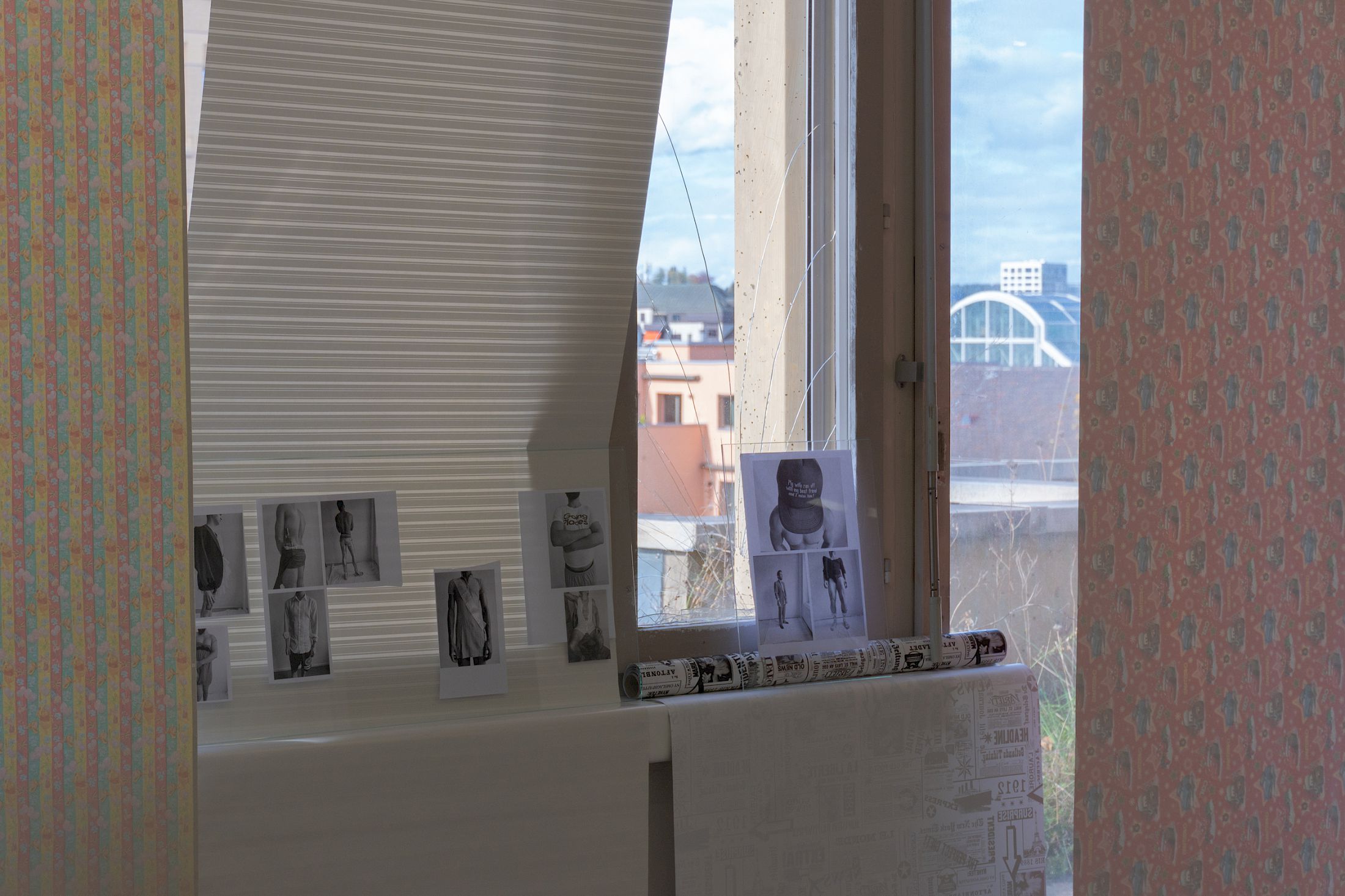 Exhibition View Solo Show Sven Gex «celebratory ; view on printed images from the ‚character fitting‘ series 2021-ongoing, gift wrapping paper, nails, glass» at Halmet, Zurich-Oerlikon, 2025 / Photo: Tereza Glazova / Courtesy: the artist and Halmet