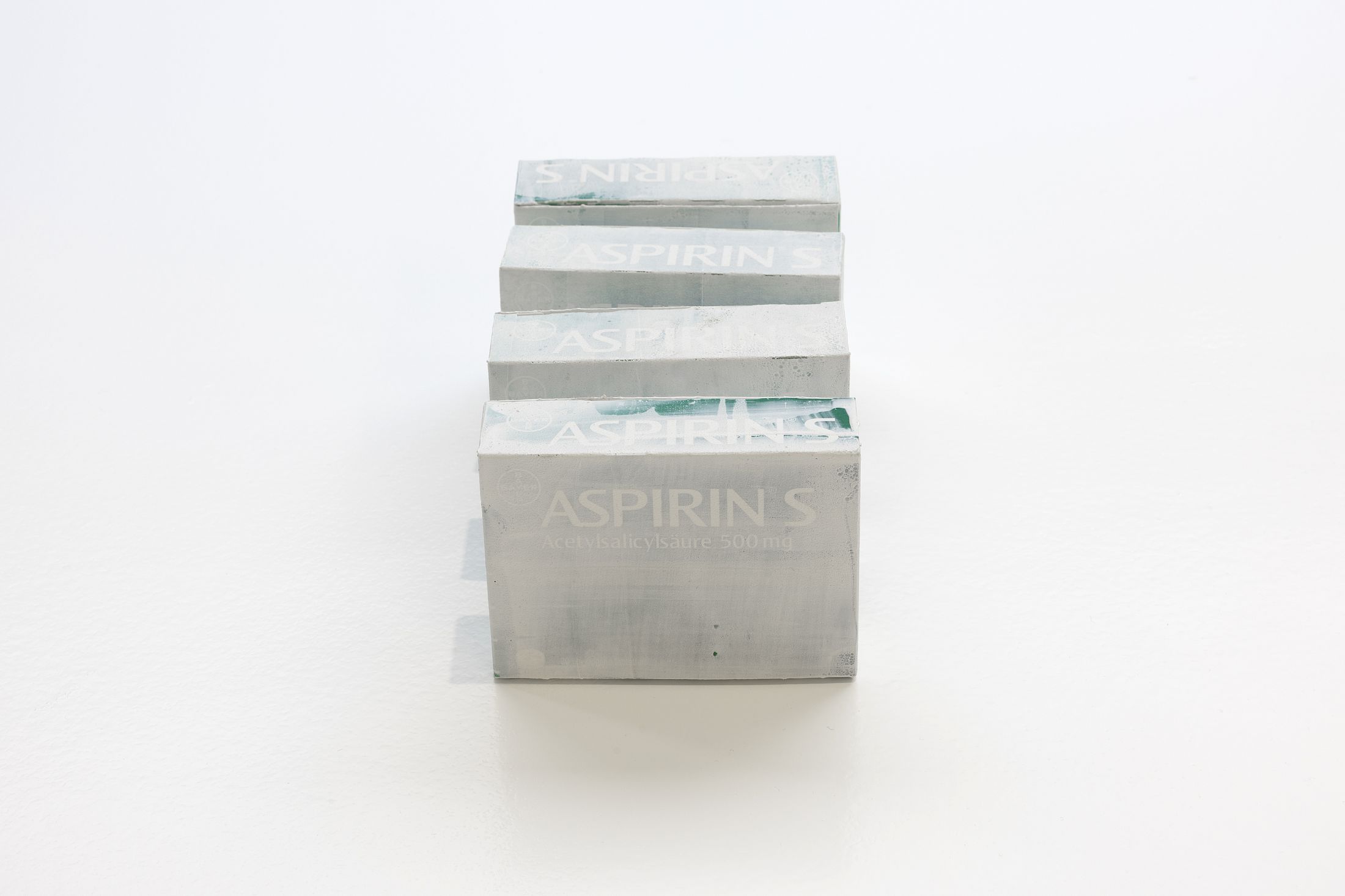 Exhibition View Group Show «Zu Gast in einer Strasse ; view on Dominic Michel, Chambers, 2025, Gesso on packaging boxes, each 11 x 8 x 3 cm» at Contemporary Fine Arts, Basel, 2026 / Photo: Gina Folly / Courtesy: the artists and Contemporary Fine Arts