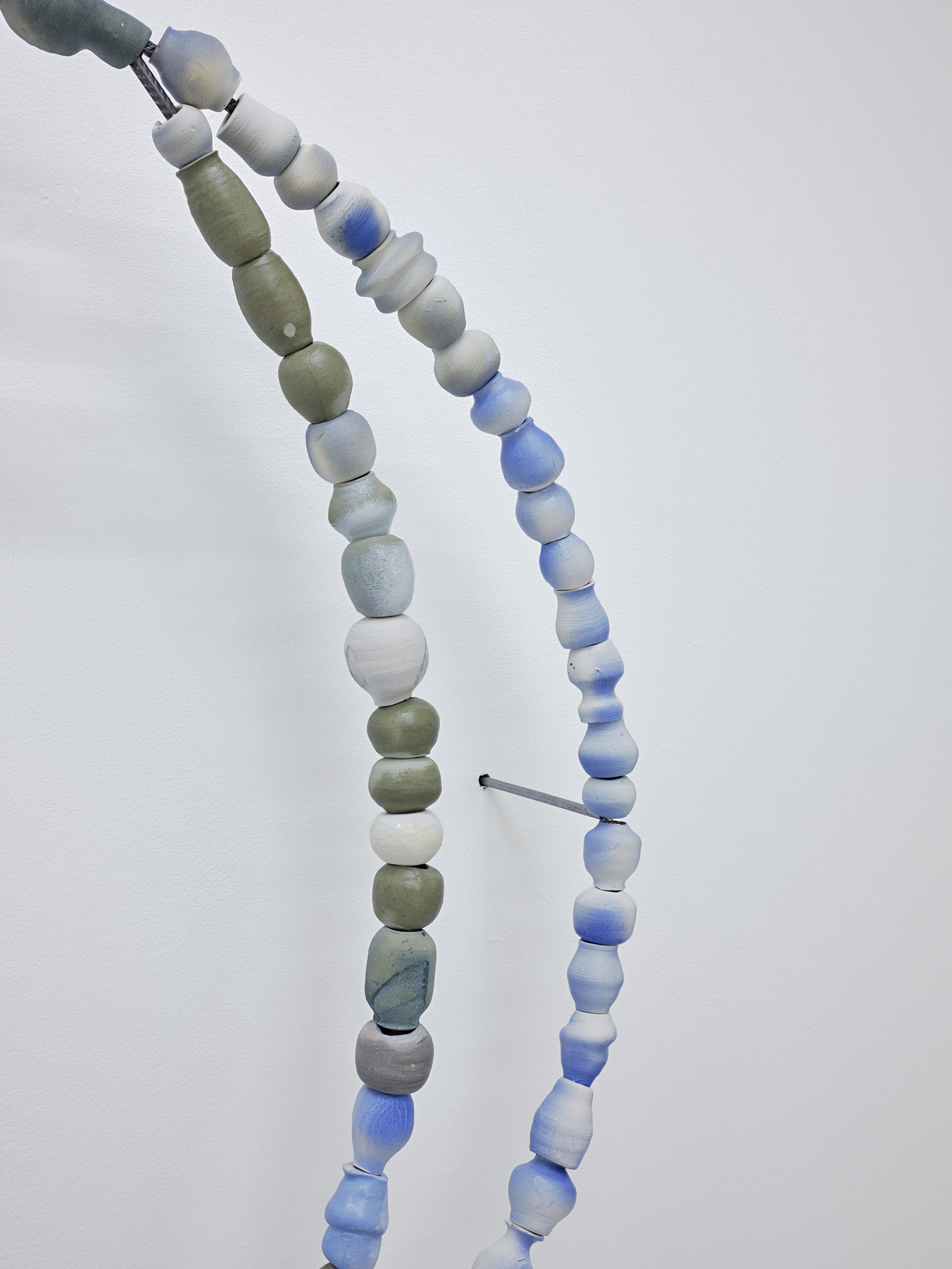 Exibition View Solo Show Camille Dumond «Everything but sliced ; view on Some things that used to be edible are lethal now (harvest 2), 2025, part of a series of three circles on the wall, earthenware, steel, 100 × 100 cm» at Ferme de la Chapelle, Geneva, Grand-Lancy, 2025 / Photo: Nicolas Delaroche / Courtesy: the artist and Ferme de la Chapelle