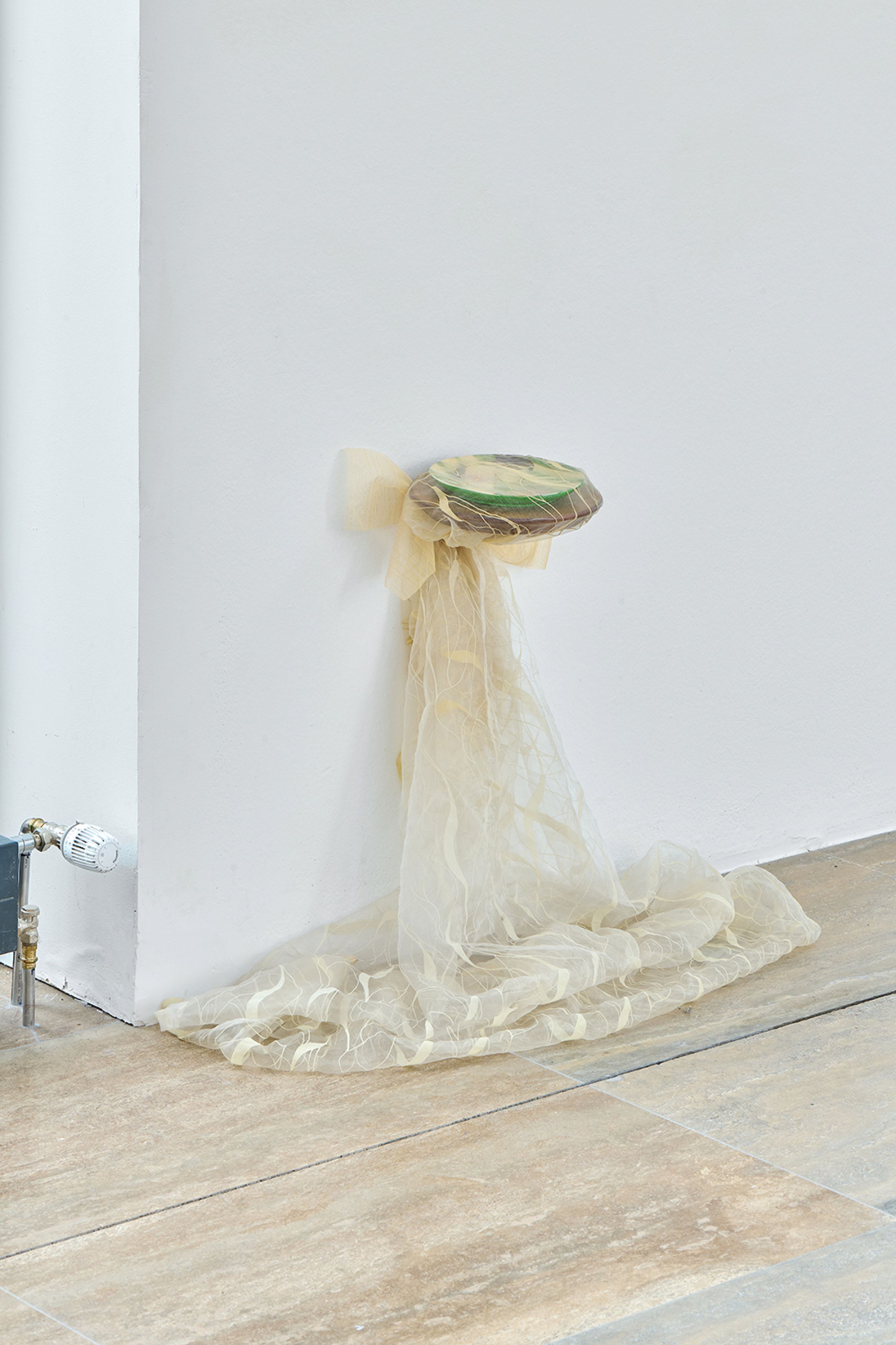 Exhibition View Duo Show Cathy Josefowitz and Jessy Razafimandimby «Valse Velue ; view on J. Razafimandimby, untitled, 2025, Wood, tulle, Variable dimensions ; C. Josefowitz, untitled, c. 1974, Oil on wood (plate), 19.3 cm» at Halle Nord, Geneva, 2026 / Photo: Thomas Maisonnasse / Courtesy: the artists and Halle Nord