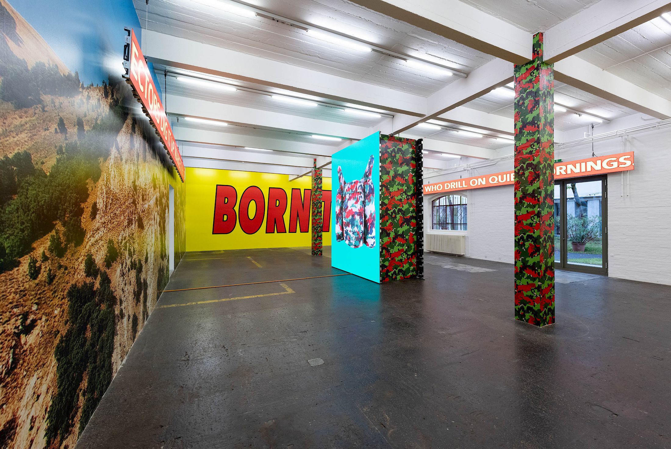 Exhibition View Solo Show Cemile Sahin «BB – BORN TO BLOOM ; view on BB – BORN TO BLOOM, 2025, 4-channel video installation on LED screens with sound, 5min 10s, wallpaper» at Kunst Halle Sankt Gallen, Sankt Gallen, 2025 / Photo: E. Sommer / Courtesy: the artist and Esther Schipper, Berlin/Paris/Seoul