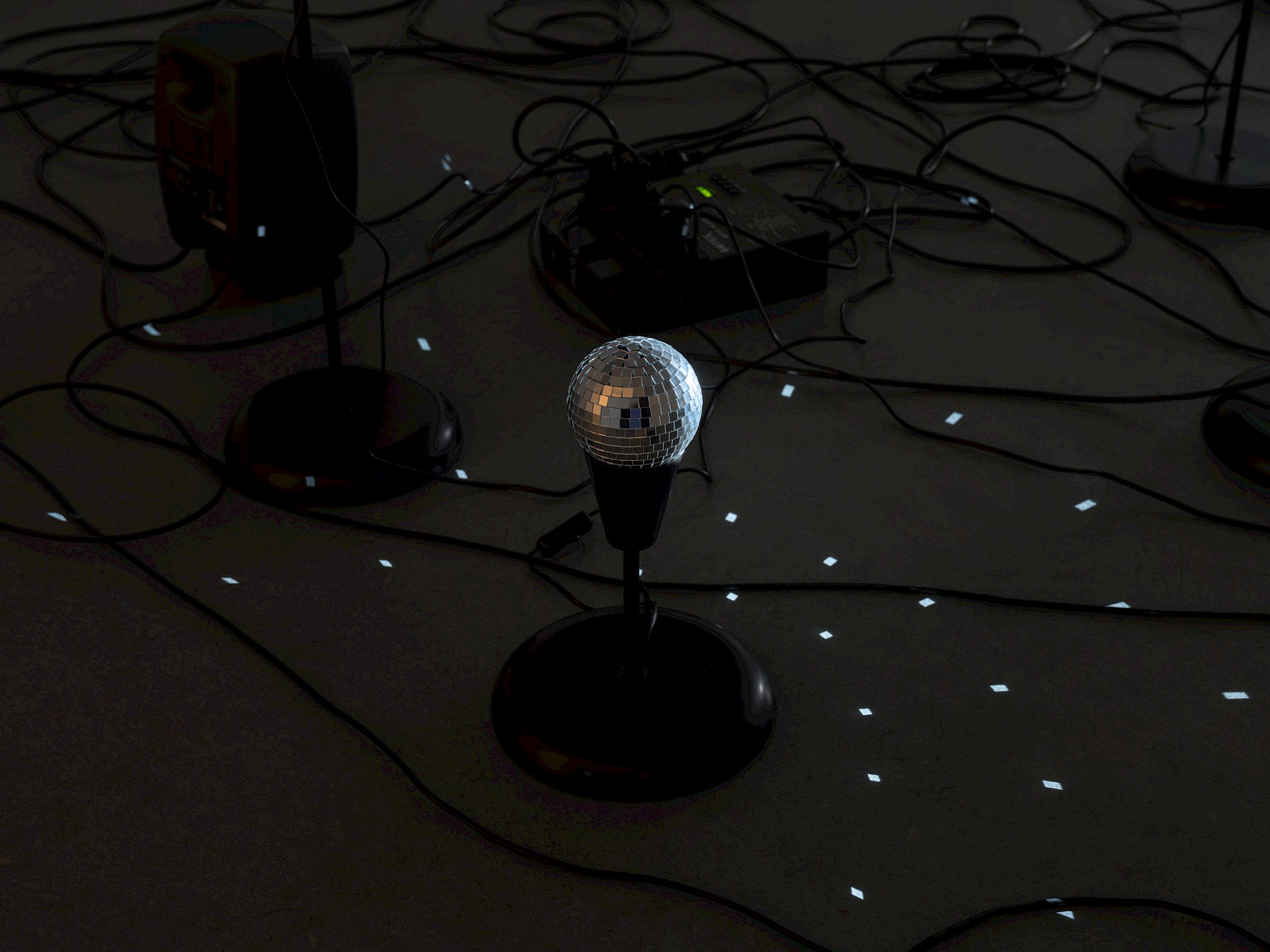 Exhibition View Solo Show Daria Blum «HOME SCREEN ; view on HOME SCREEN, detail, 2026, Programmed video, sound and light script, 20 IKEA TÅGARP lamps, 3 BOTEX DMX-Switchpacks, disco ball, loop, Dimensions variable» at marytwo, Luzern, 2026 / Photo: Julian Blum / Courtesy: the artist and marytwo