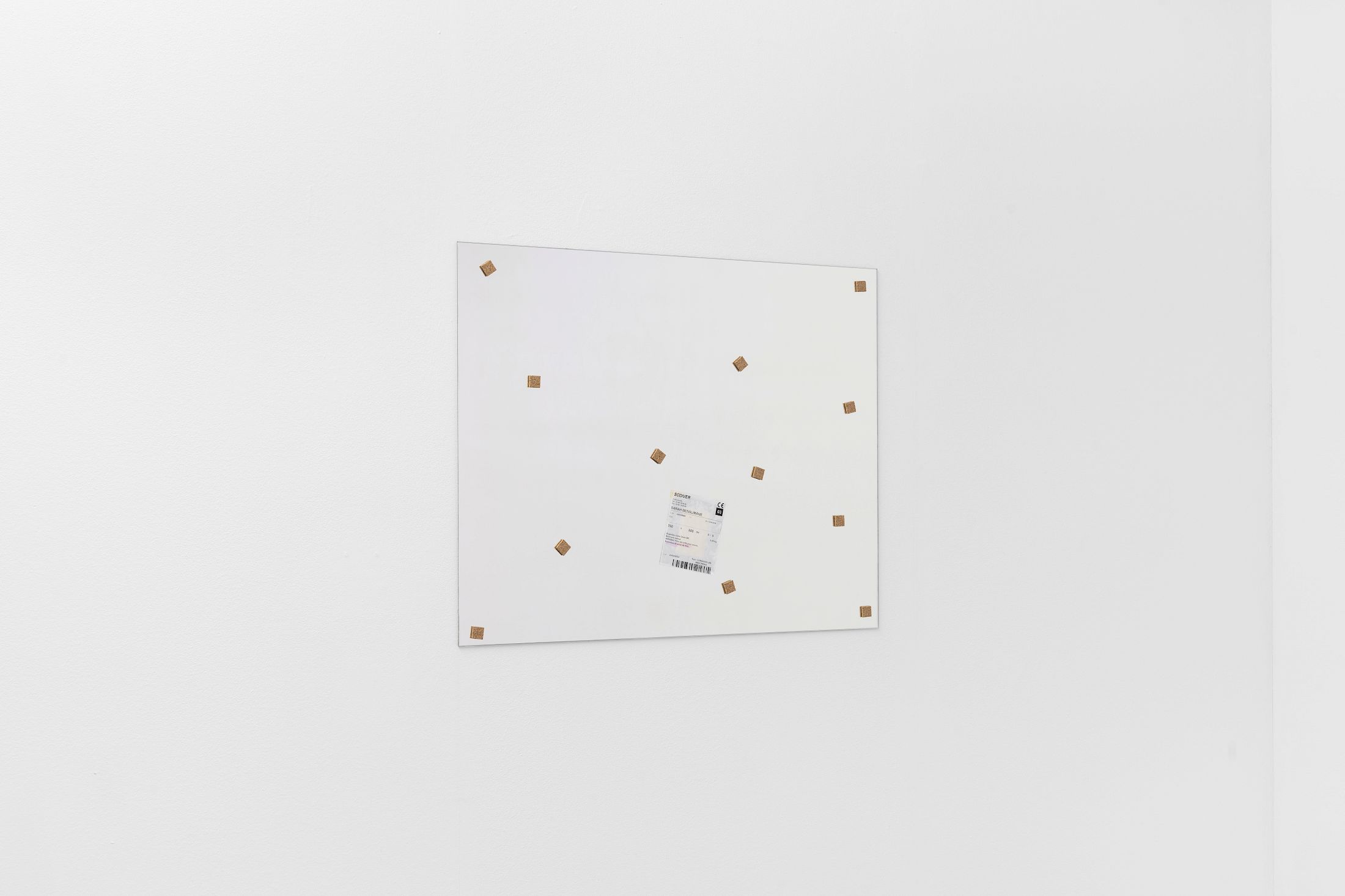 Exhibition View Group Show «Ecstatic Trance: Artists on Rock My Religion ; view on Sarah Benslimane, Untitled, 2025, Mirror, transport etiquette, cork, 60 × 76 × 1 cm» at marytwo, Luzern, 2025-2026 / Photo: Jack Pryce / Courtesy: the artist and marytwo