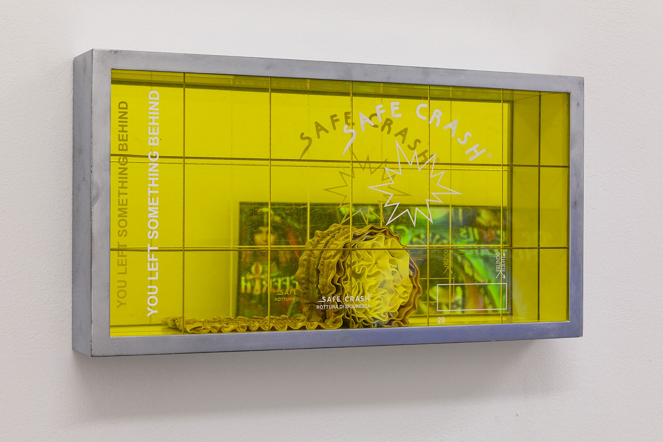 Exhibition View Solo Show Jiajia Zhang «How To Spend It ; view on Safe Crash, 2023, Found glass, lacquered wooden frame, mirror, vinyl, fabric, 25 × 51.5 × 5.5cm» at Milieu, Bern, 2025 / Photo: Jiří Makovec / Courtesy: the artist and Milieu