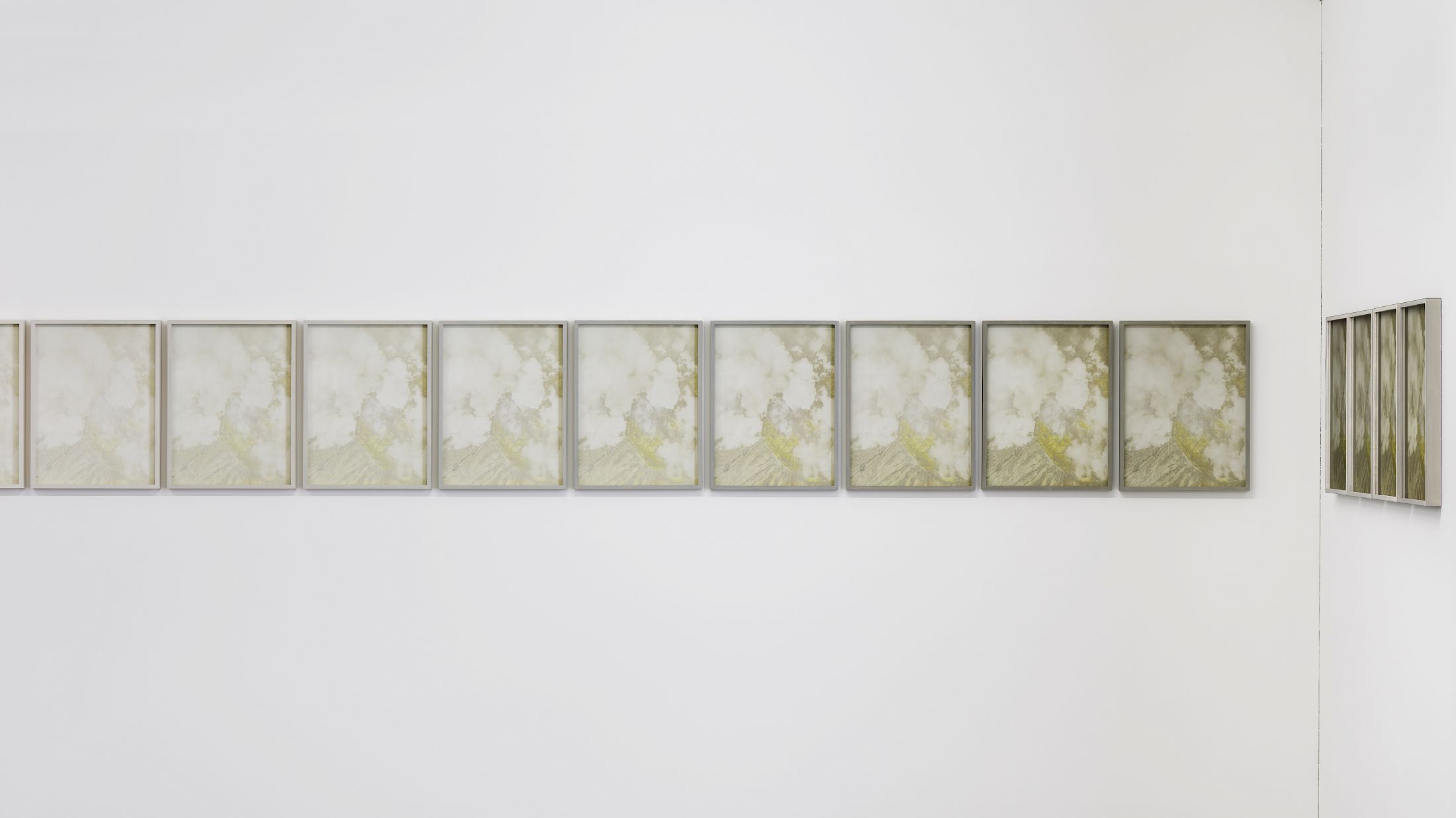 Exhibition View Solo Show Julian Charrière «After the Smoke Cradle ; view on After the Smoke Cradle  (Vog 1-33), 2025, Photolithography with pigments made from volcanic ash, lava, obsidian, and sulfur, in artist's frame, 42.2 x 32.2 x 3 cm» at Edition VFO, Zurich, 2026 / Photo: Bernhard Strauss / Courtesy: the artist and Edition VFO