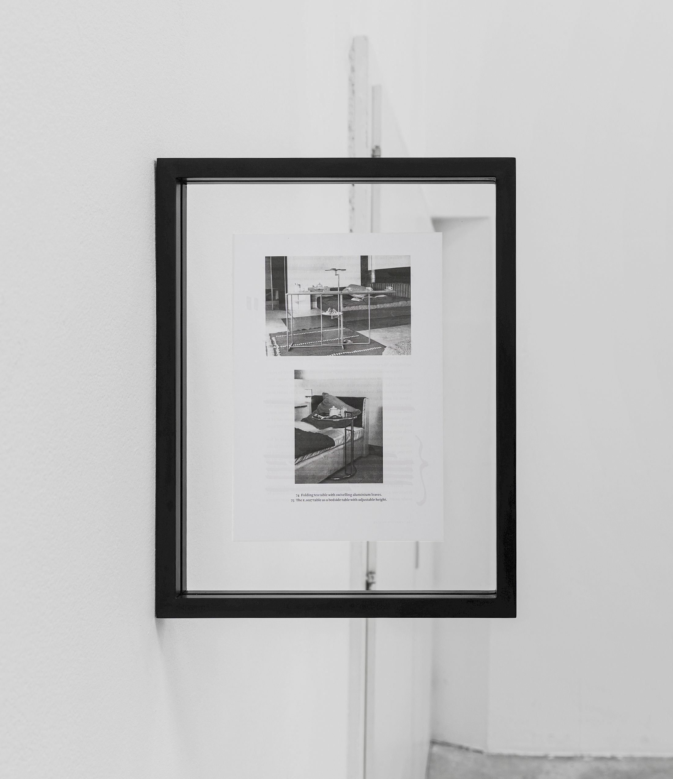 Exhibition View Solo Show Lauryn Youden «I wanna hold the hand inside you ; view on à lire avec les trois cigarettes oubliées, 2025, series of 12 pages from Peter Adam’s Eileen Gray: Her Life and Work, red ink, charcoal stained frames, 35 × 27.5 × 3 cm (each), dimensions variable (all 12x)» at CIRCUIT, Lausanne, 2025 / Photo: Aude Mayer / Courtesy: the artist and CIRCUIT