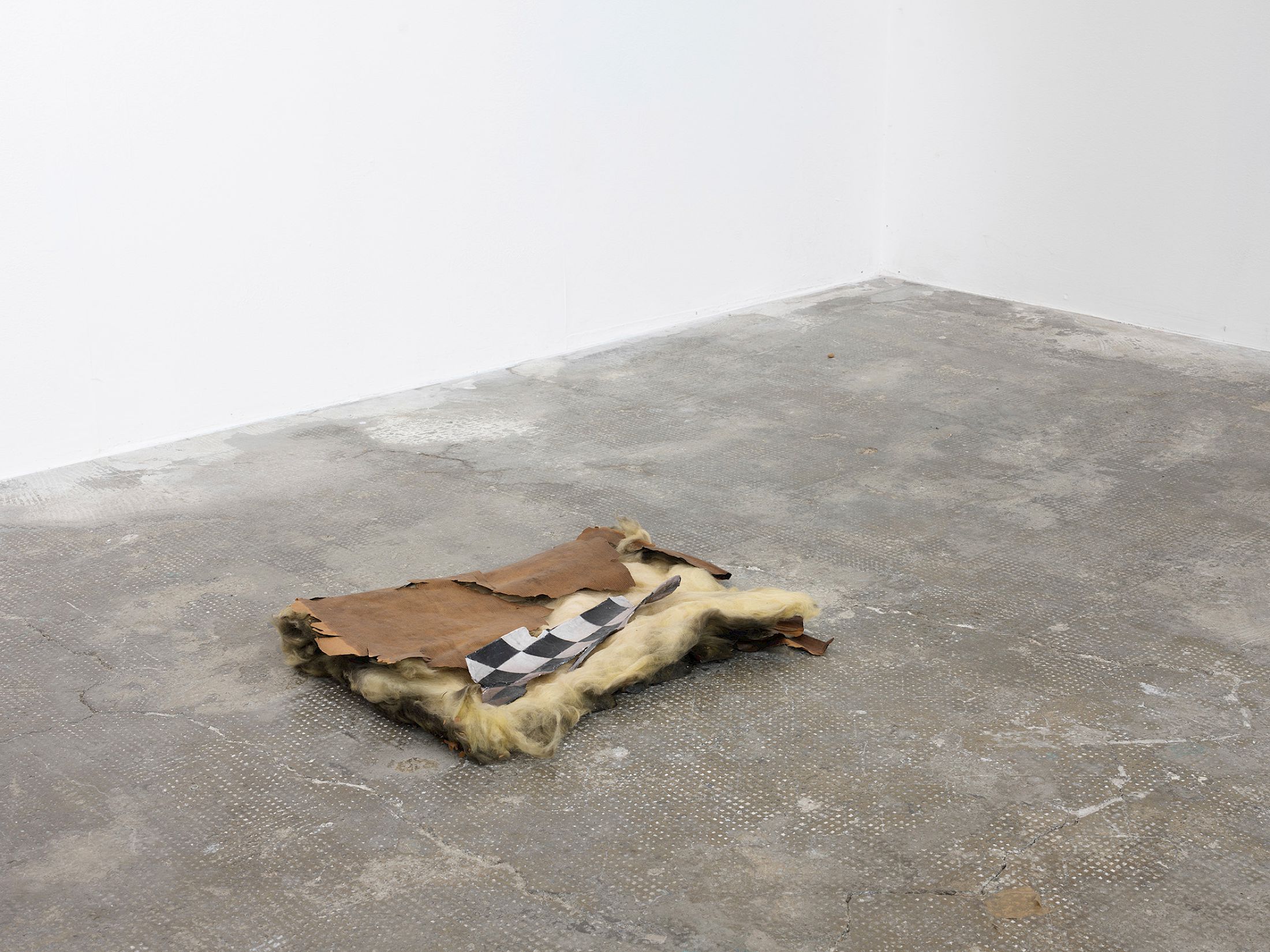 Exhibition View Group Show «Long distance relationship ; view on Hélène Janicot, Untitled, 2025, insulation foam, photograph on bark, 45 × 35cm» at Smallville, Neuchâtel, 2025 / Photo: Sebastien Verdon / Courtesy: the artists and Smallville