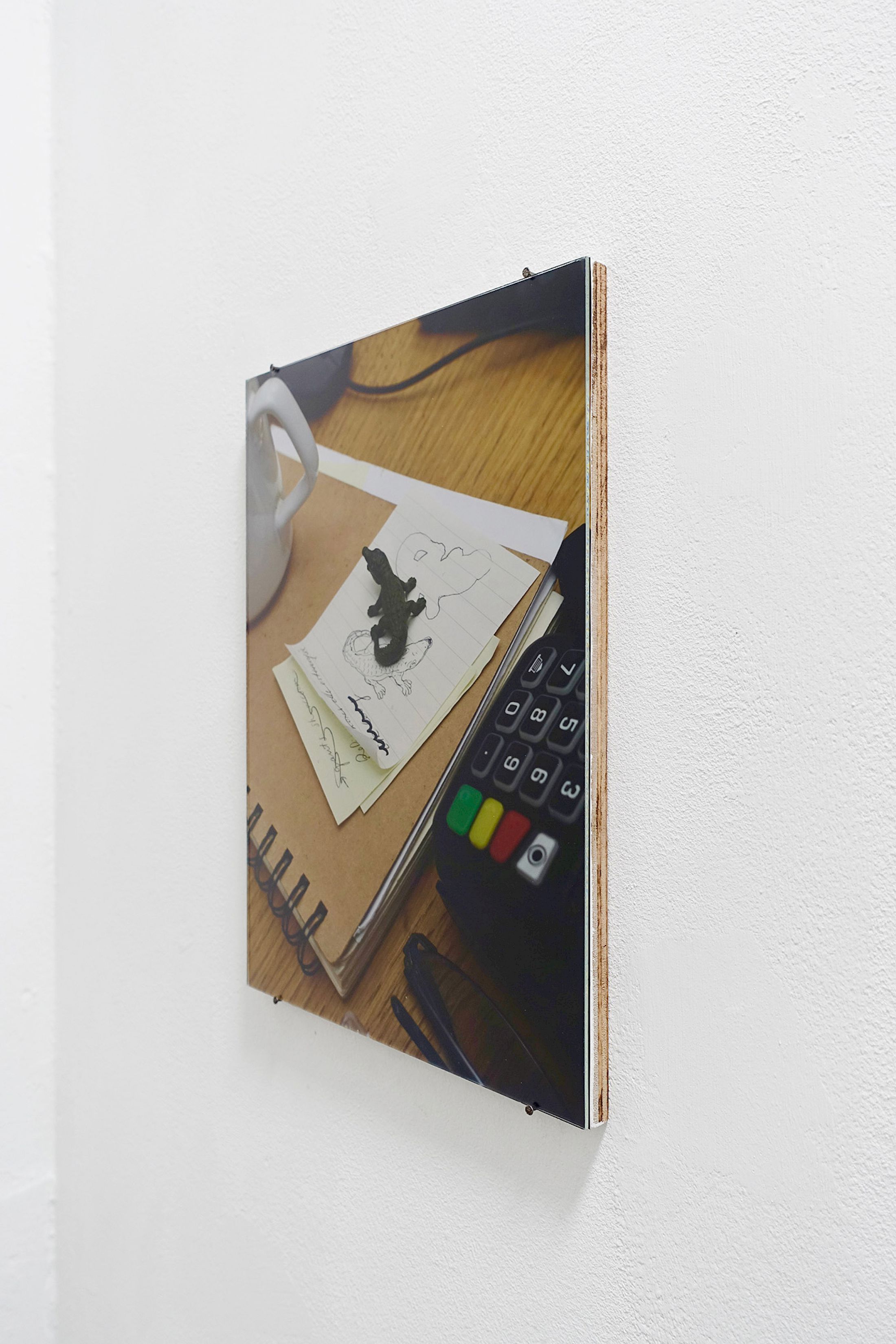 Exhibition View Group Show «Long distance relationship ; view on Hélène Janicot, Slither, 2025, injekt print on paper mounted on wood, anti-UV glass, 24 × 32cm» at Smallville, Neuchâtel, 2025 / Photo: Sebastien Verdon / Courtesy: the artists and Smallville