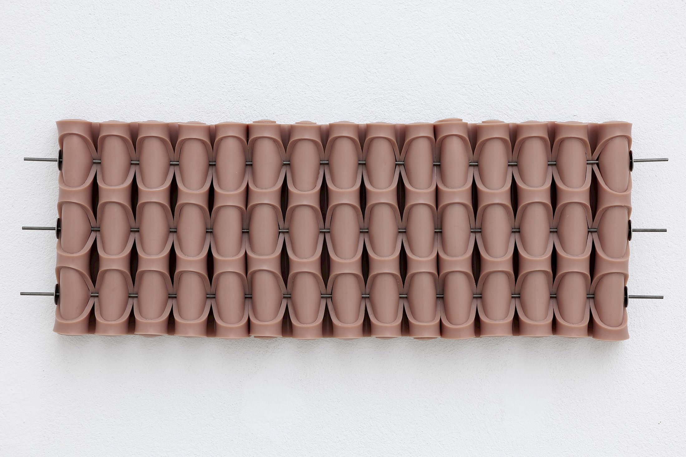 Exhibition View Solo Show Marlie Mul «Das Budget ; view on Large Charm (Solid), silicone with stainless steel, 2025» at Kunsthaus Glarus, Glarus, 2025 / Photo: Gina Folly /  Courtesy: the artist and Galerie Croy Nielsen, Vienna