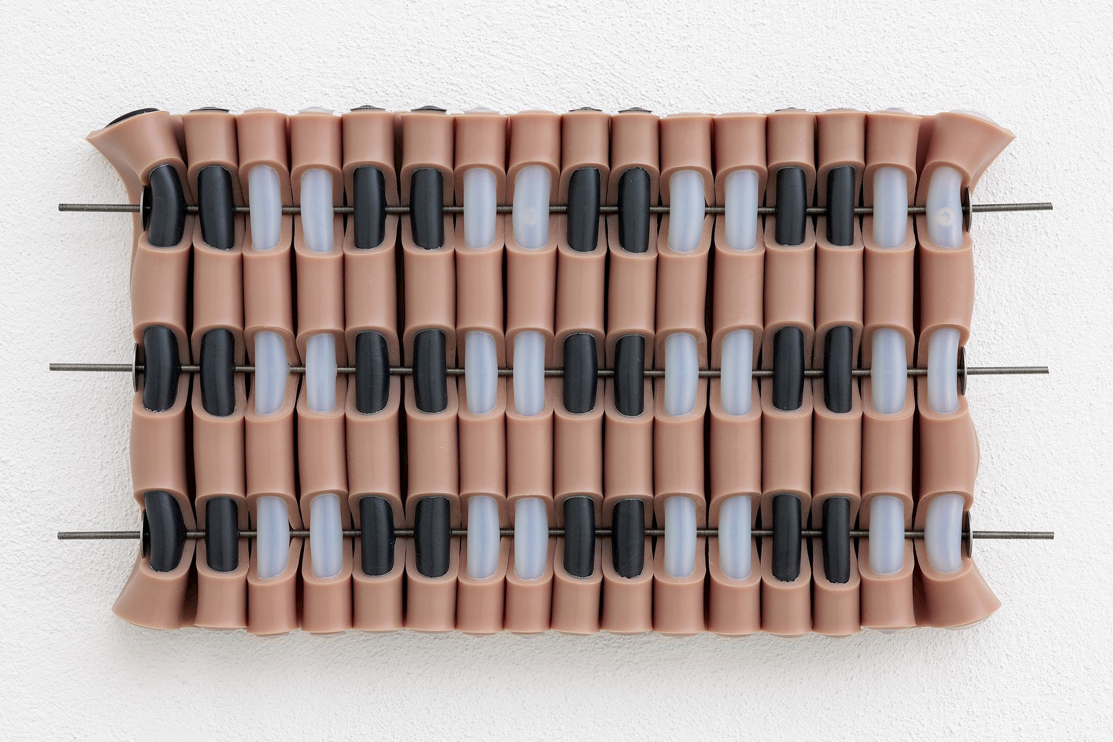 Exhibition View Solo Show Marlie Mul «Das Budget ; view on Large Charm (Pellet), silicone with stainless steel, 2025» at Kunsthaus Glarus, Glarus, 2025 / Photo: Gina Folly /  Courtesy: the artist and Galerie Croy Nielsen, Vienna