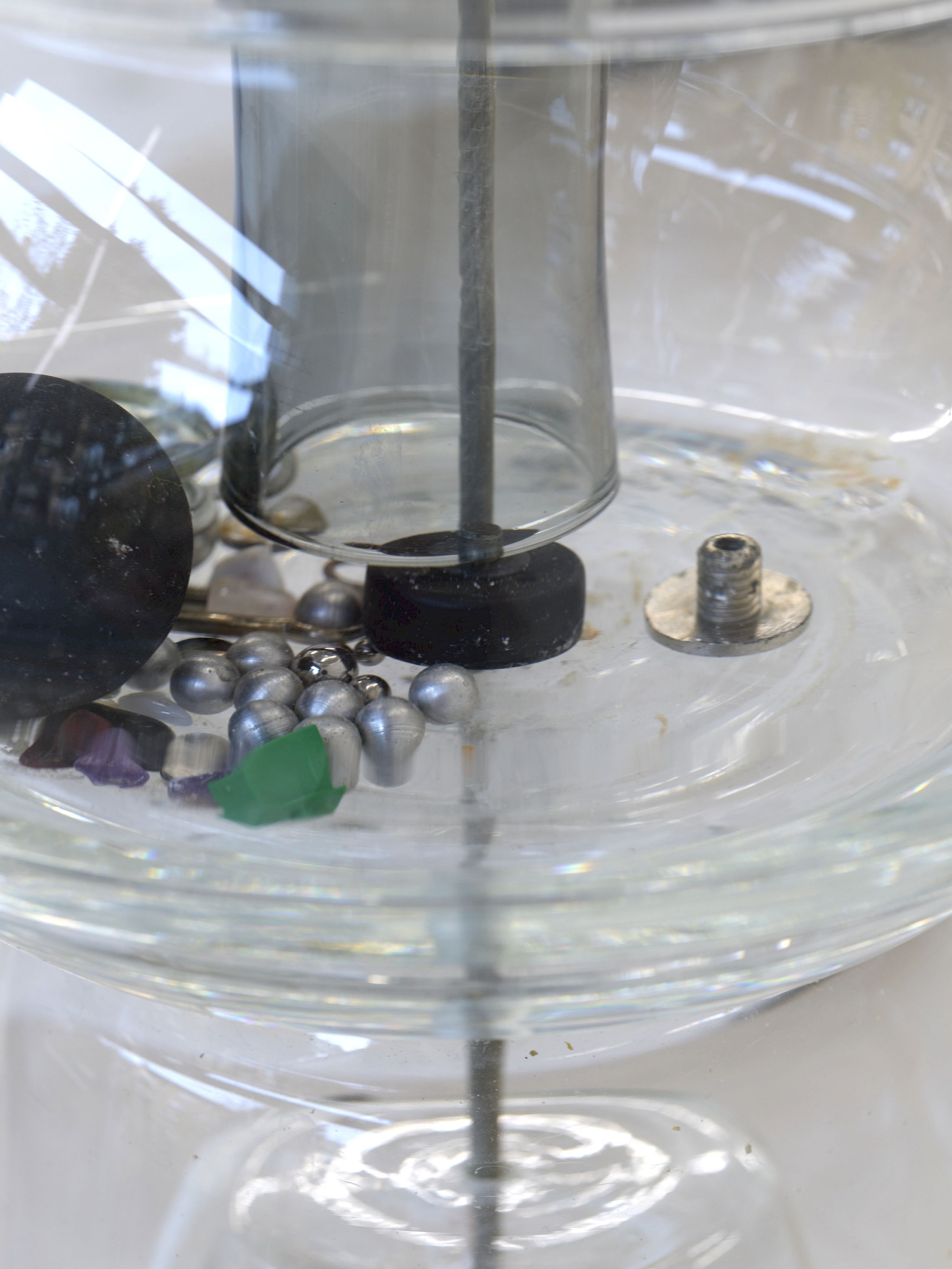 Exhibition View Solo Show Mathis Pfäffli «Meteora ; view on Collector XII (detail), 2025, found and collected glass, found metal objects, metal wires, screws, hooks, gathered findings, 80 × 25 cm» at Damien and the Love Guru, Zurich, 2025-2026 / Photo: Felix Jungo / Courtesy: the artist and Damien and the Love Guru