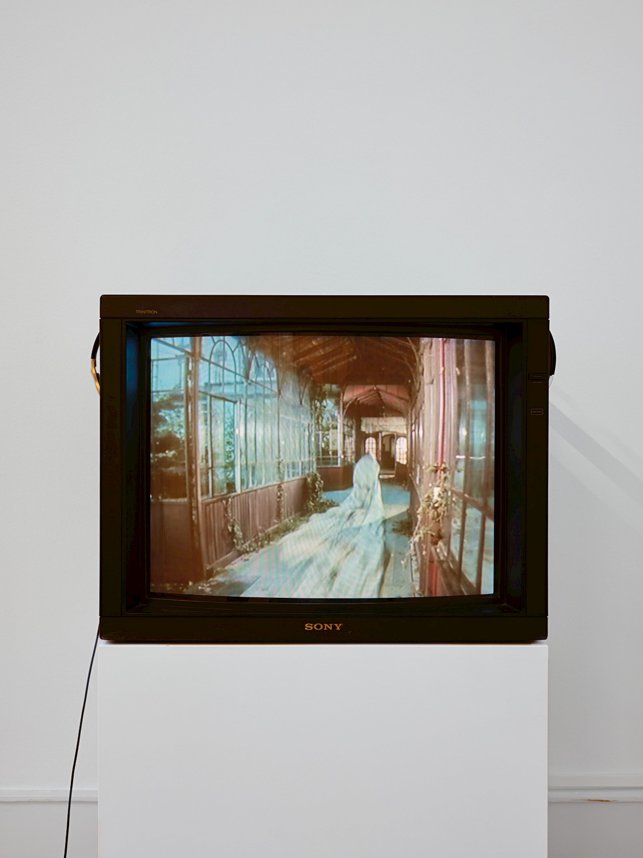 Exhibition View Group Show «Stitches: A Haunted House and Other Ghost Stories ; view on Heidi Bucher: Bellevue – Kreuzlingen, 1990, directed by Michael Koechlin, dig- itized 16 mm film, 9 min., color, sound» at Villa Bernasconi, Lancy, Geneva, 2026 / Photo: Nicolas Delaroche /  Courtesy: The Estate of Heidi Bucher, Indigo Bucher & Mayo Bucher
