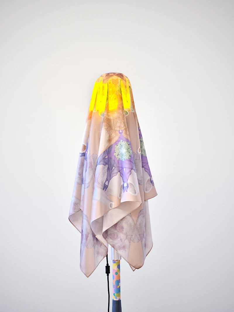 Exhibition View Group Show «Stitches: A Haunted House and Other Ghost Stories ; view on Lucie II (lampadaire), 2024, IV pole, adhesive pads, rotating beacon, silk scarf (by Sarah Schrader)» at Villa Bernasconi, Lancy, Geneva, 2026 / Photo: Nicolas Delaroche / Courtesy: the artist and Galerie Sultana