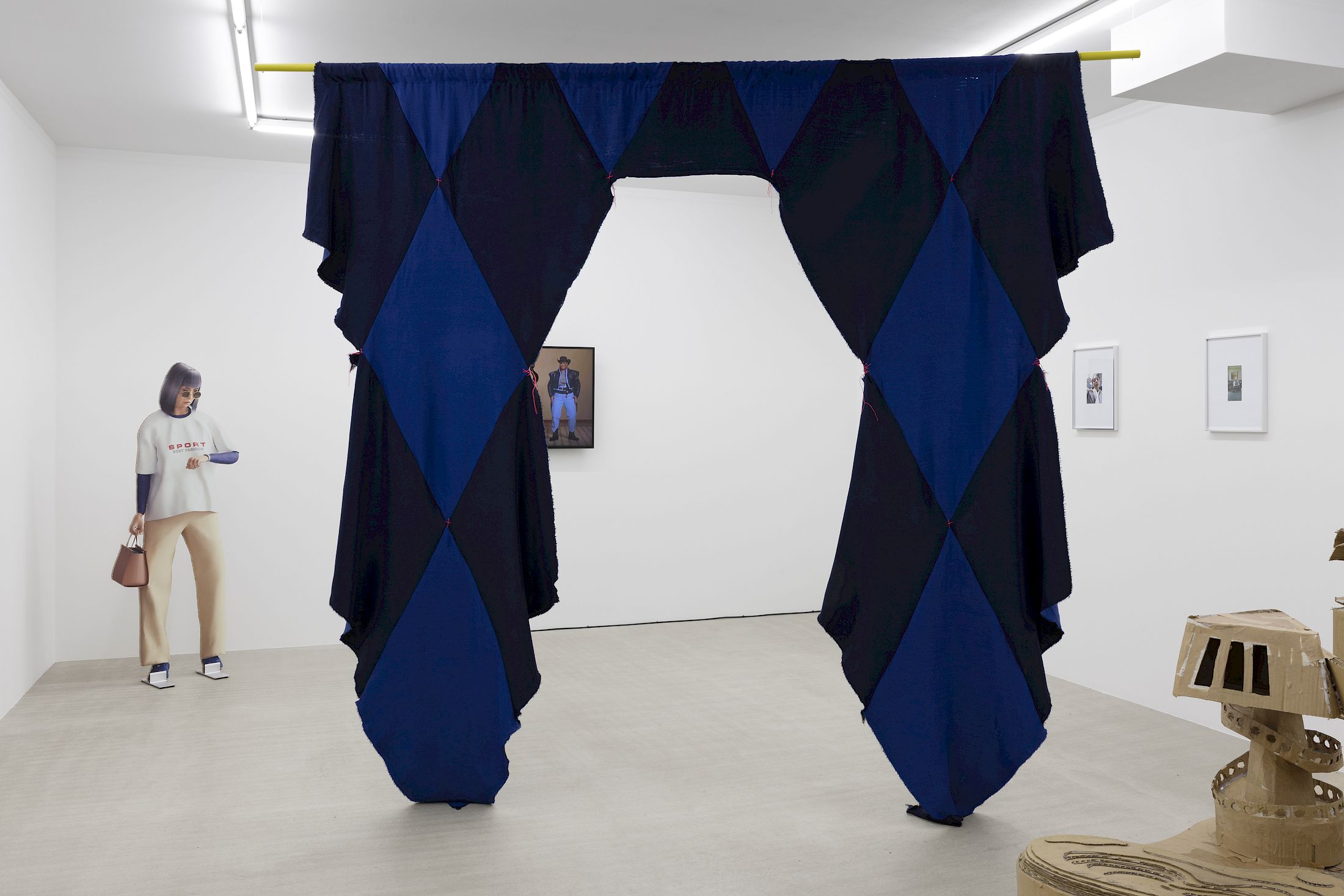 Exhibition View Group Show «Wear a mask and your face grows to fit it ; view on Melanie Jame Wolf, Threshold II (finite jest), 2025, fabric, wood, embroidery cotton, 300 × 380 cm» at For, Basel, 2025 / Photo: Gina Folly / Courtesy: the artists and For