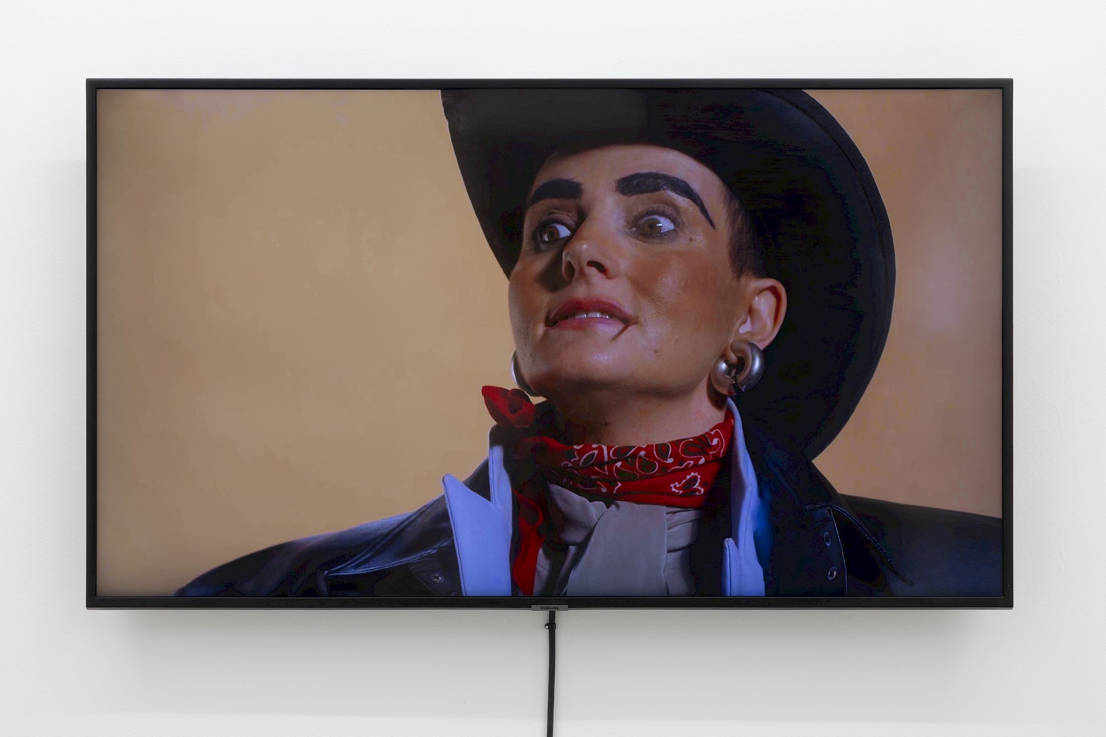 Exhibition View Group Show «Wear a mask and your face grows to fit it ; view on Melanie Jame Wolf, The Creep, 2024, single channel 4K video, colour, sound, 14 minutes 40 seconds» at For, Basel, 2025 / Photo: Gina Folly / Courtesy: the artists and For
