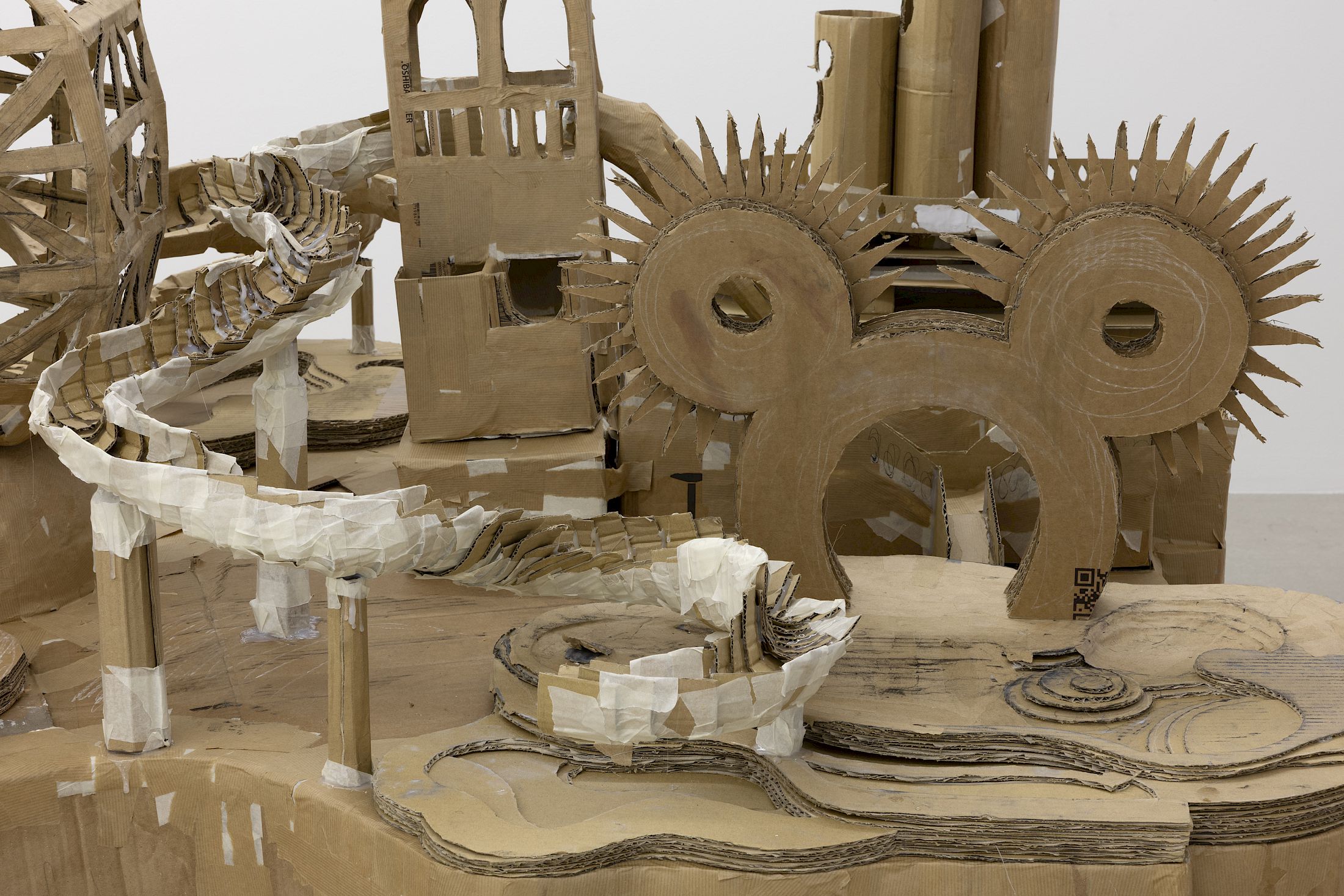 Exhibition View Group Show «Wear a mask and your face grows to fit it ; view on Sebastián Dávila, Modelo para una isla (Detail), 2025, cardboard, 250 × 130 × 100 cm» at For, Basel, 2025 / Photo: Gina Folly / Courtesy: the artists and For