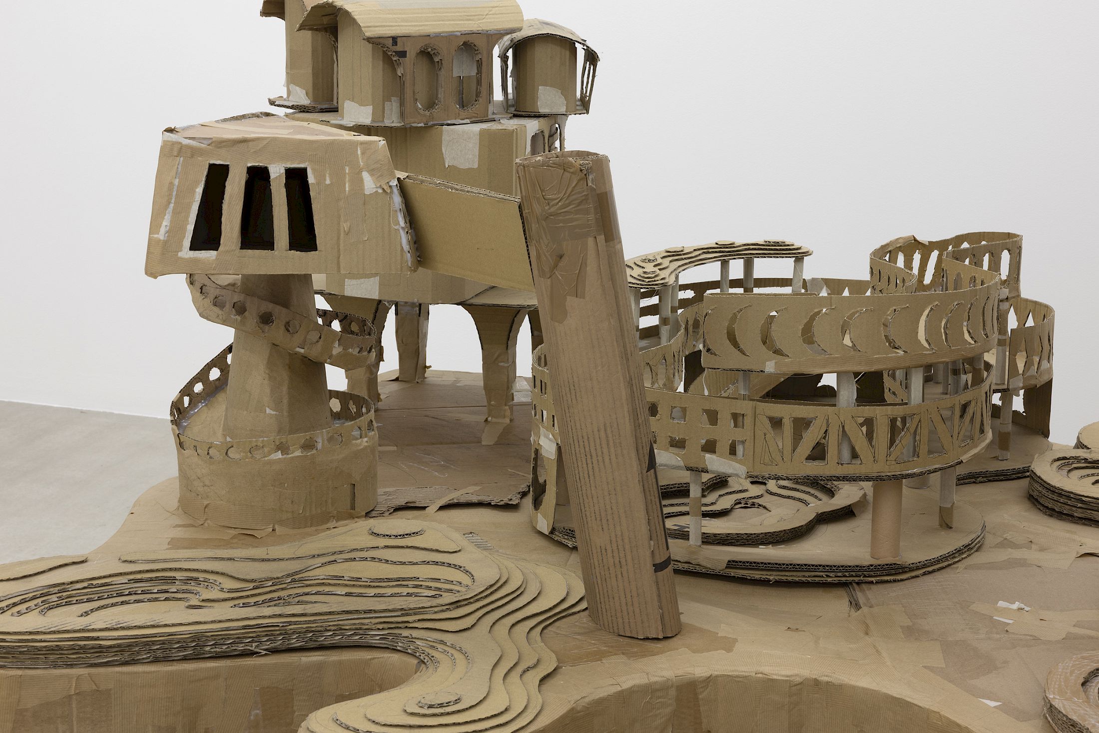 Exhibition View Group Show «Wear a mask and your face grows to fit it ; view on Sebastián Dávila, Modelo para una isla (Detail), 2025, cardboard, 250 × 130 × 100 cm» at For, Basel, 2025 / Photo: Gina Folly / Courtesy: the artists and For